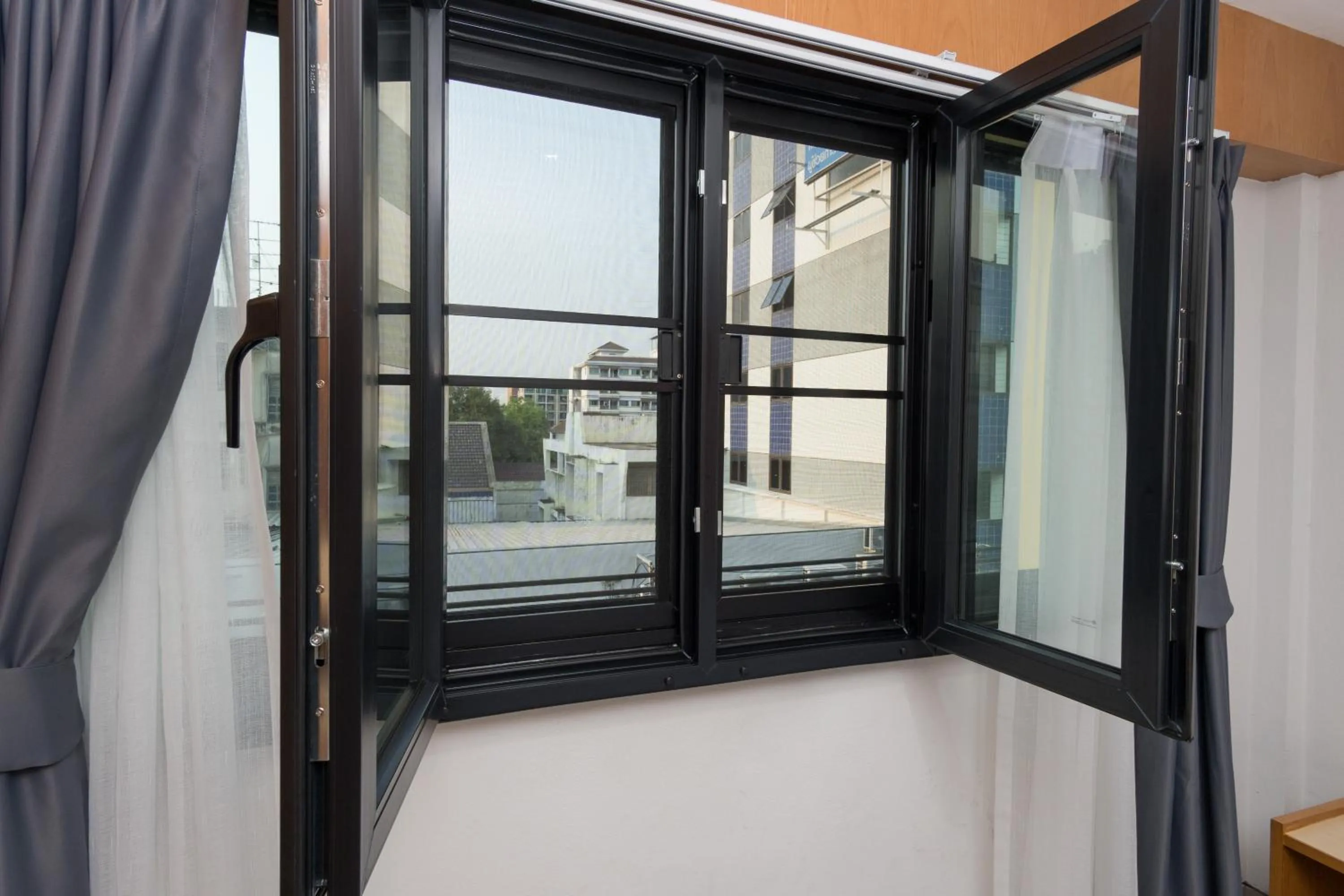 Bedroom in Homies Ratchada Hotel