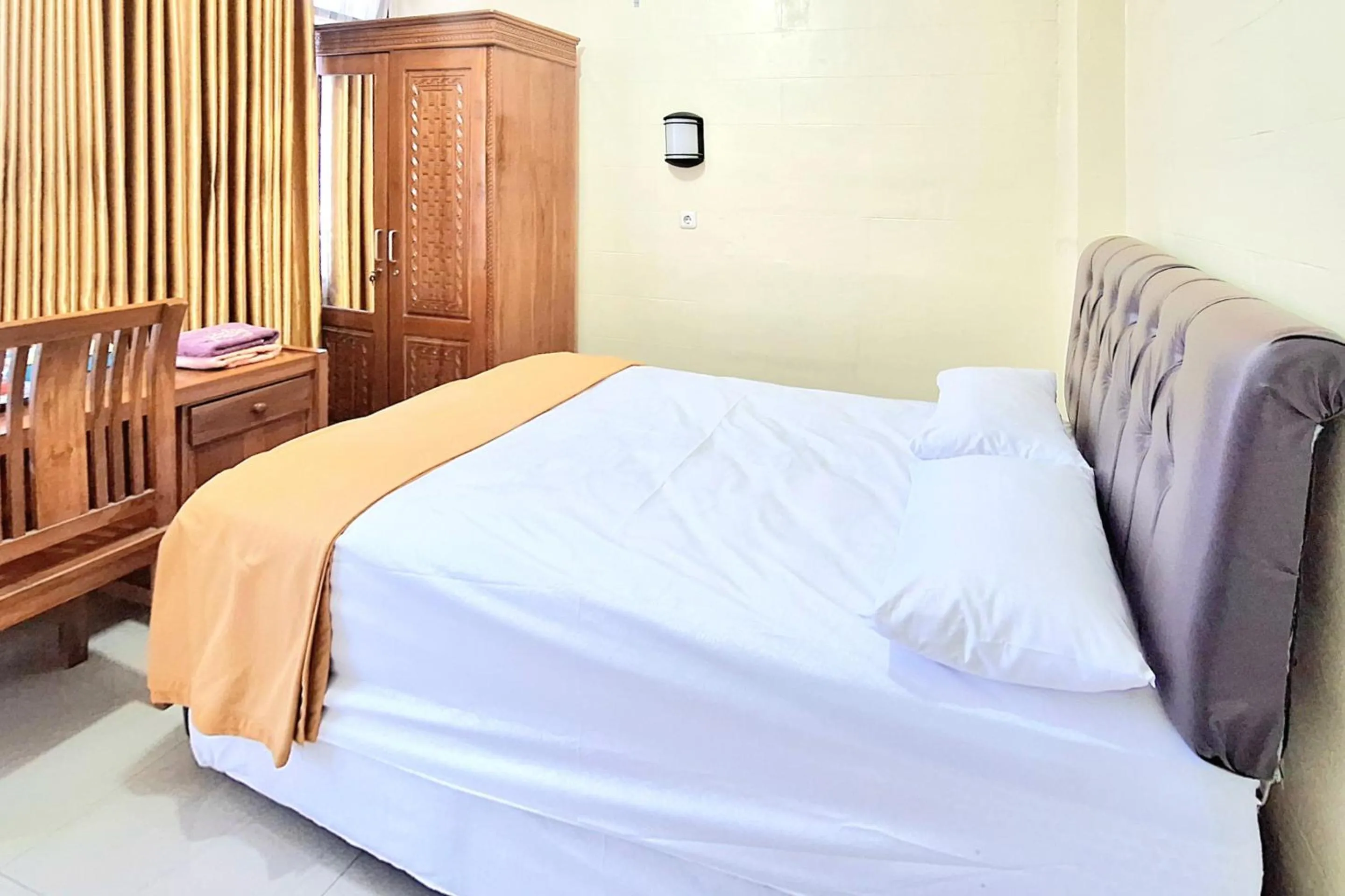 Bed in Griya Pradipa Syariah Near Balai Kota Batu Mitra RedDoorz