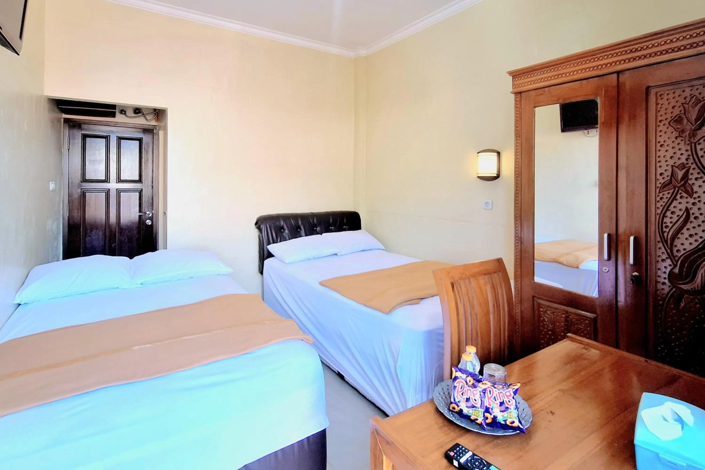 Bedroom in Griya Pradipa Syariah Near Balai Kota Batu Mitra RedDoorz