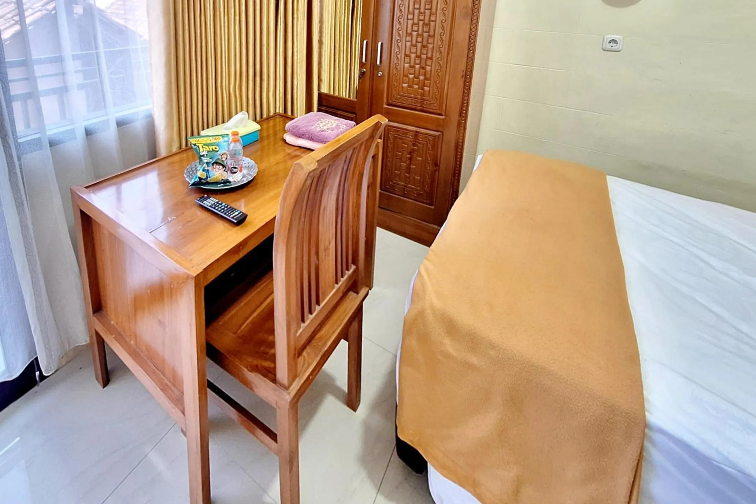 Bedroom in Griya Pradipa Syariah Near Balai Kota Batu Mitra RedDoorz