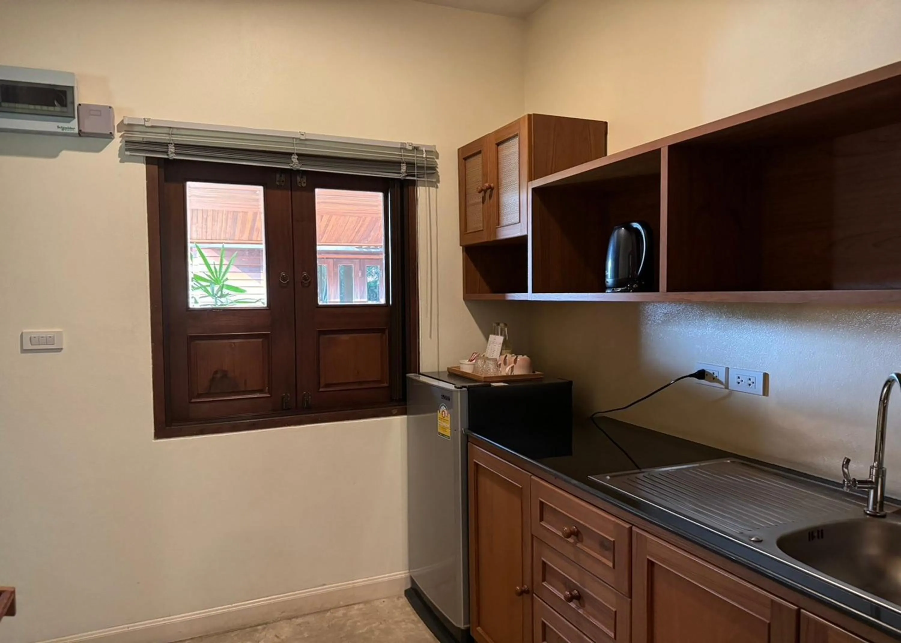 Kitchen or kitchenette in Karina Resort Chiang Mai