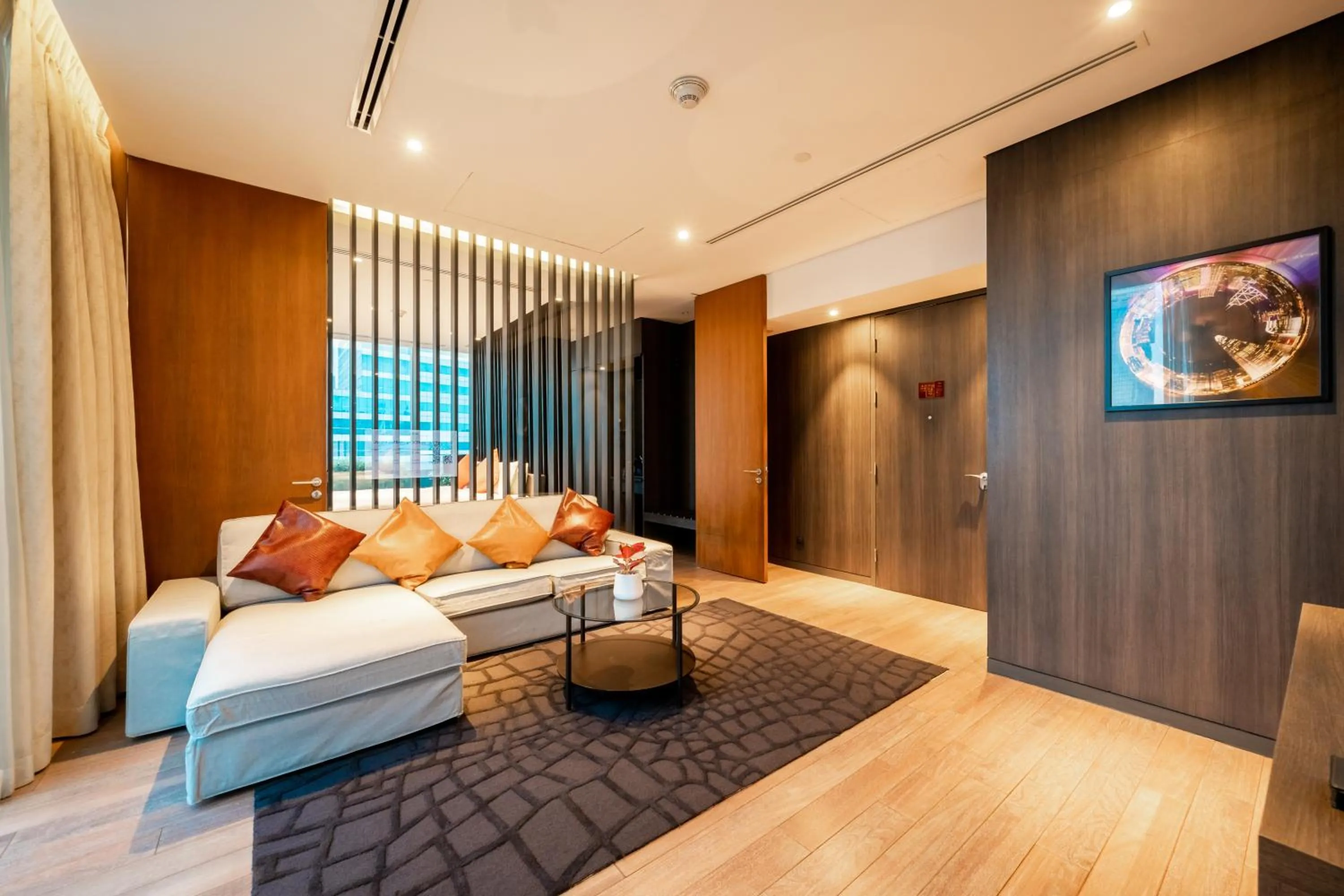 Living room, Bed in Amara Bangkok Hotel