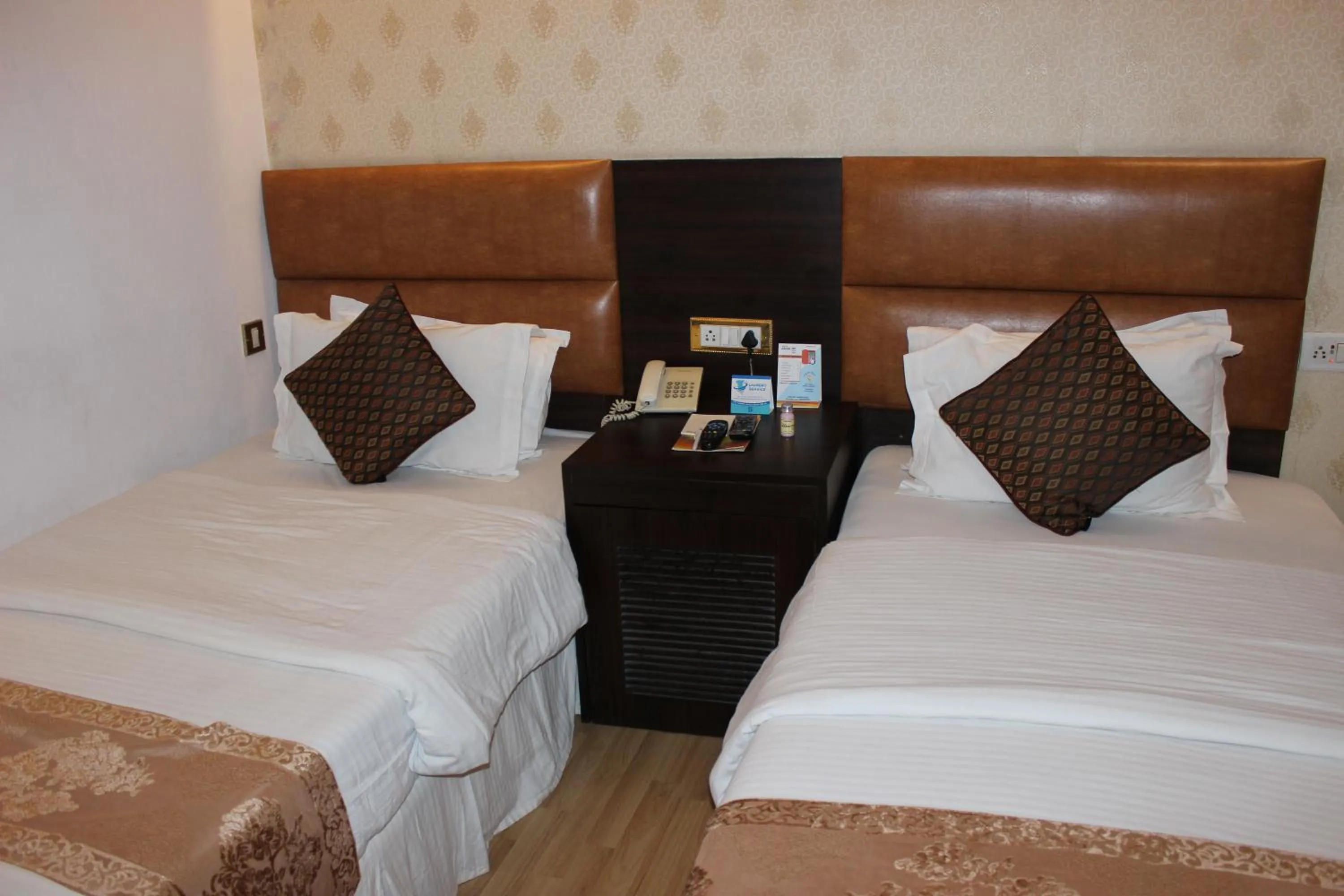 Bed in Hotel Jukaso Inn Down Town