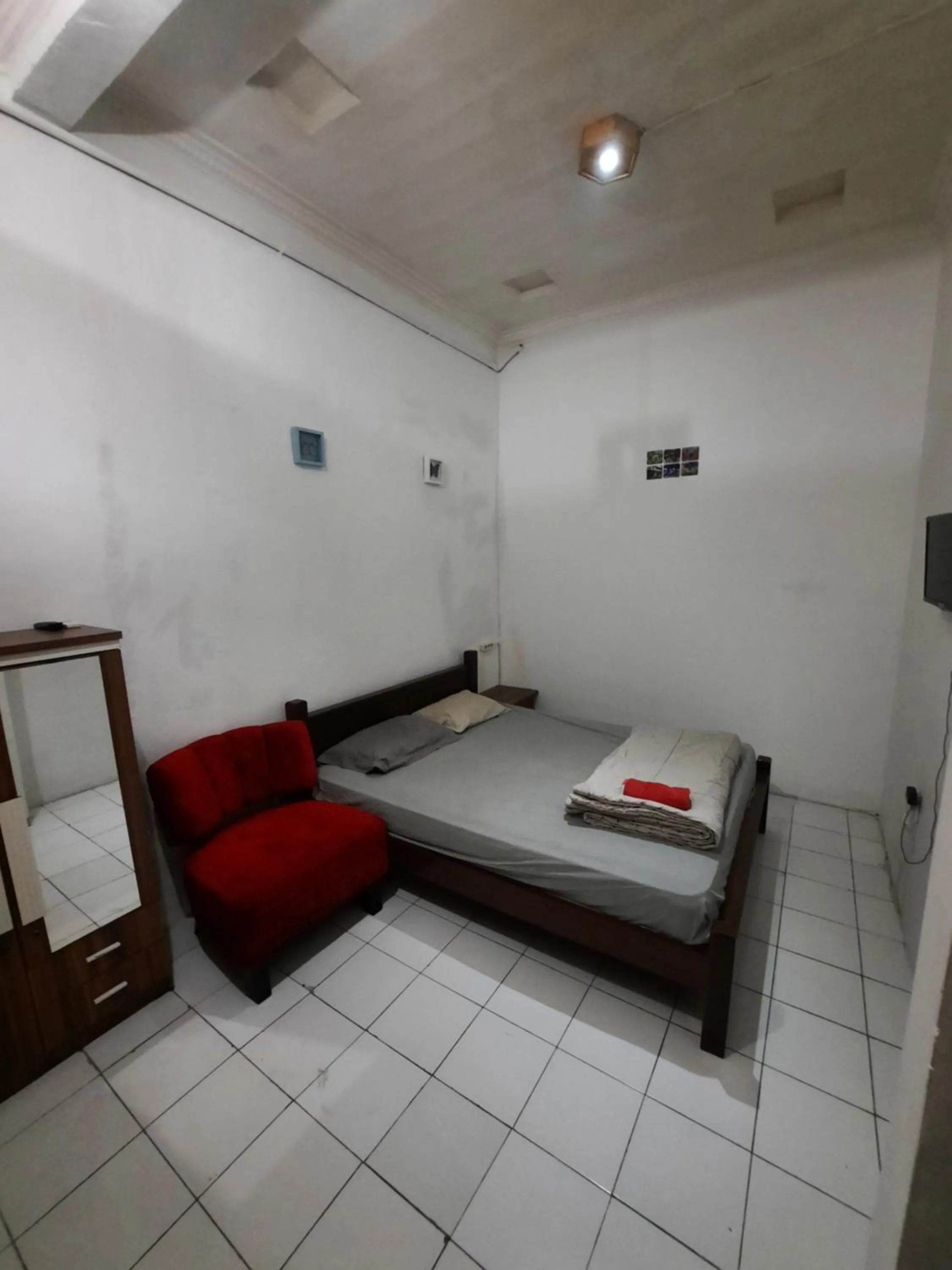 Bed in WISMA ACIDALIA SYARIAH