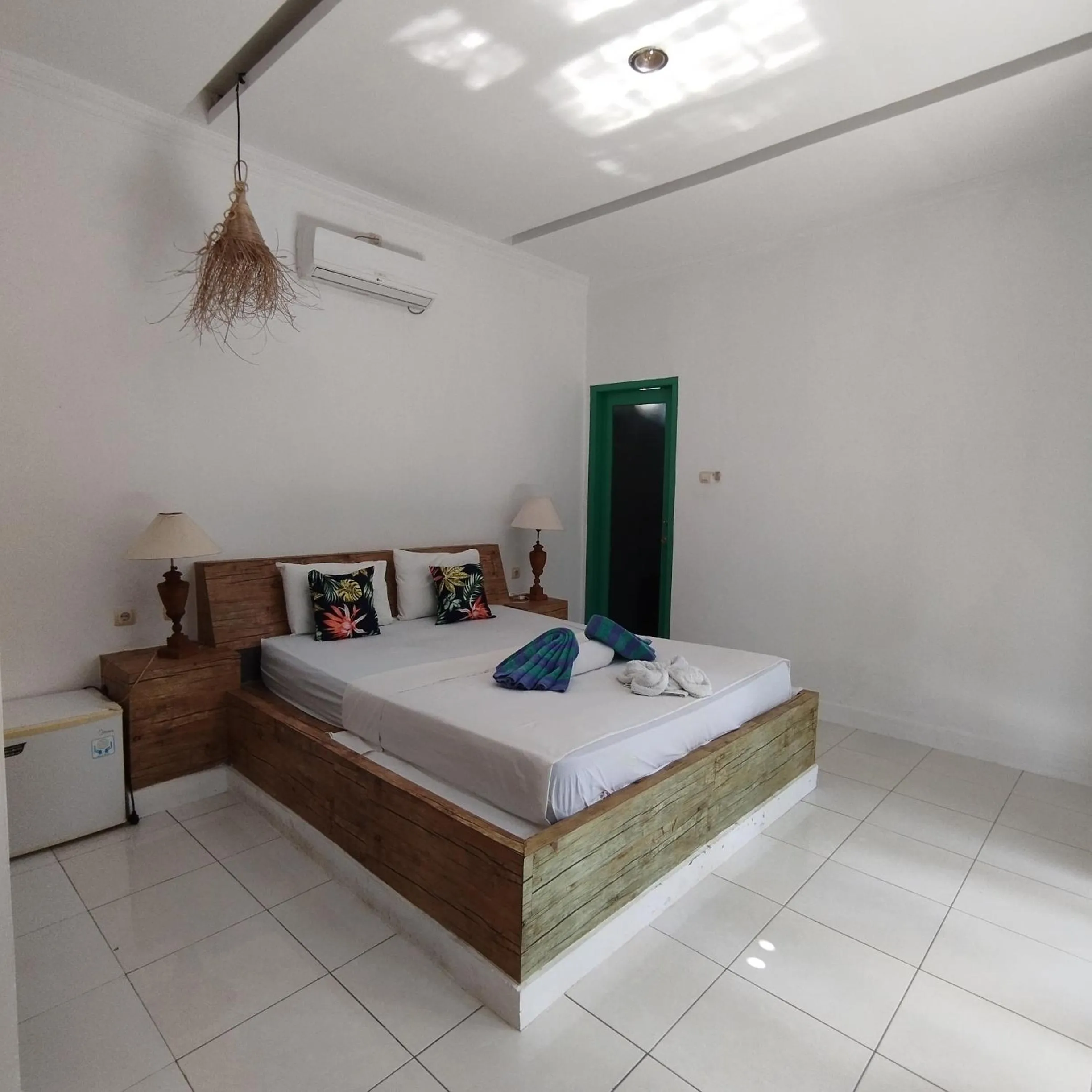 Bed in Palm Trees Villas