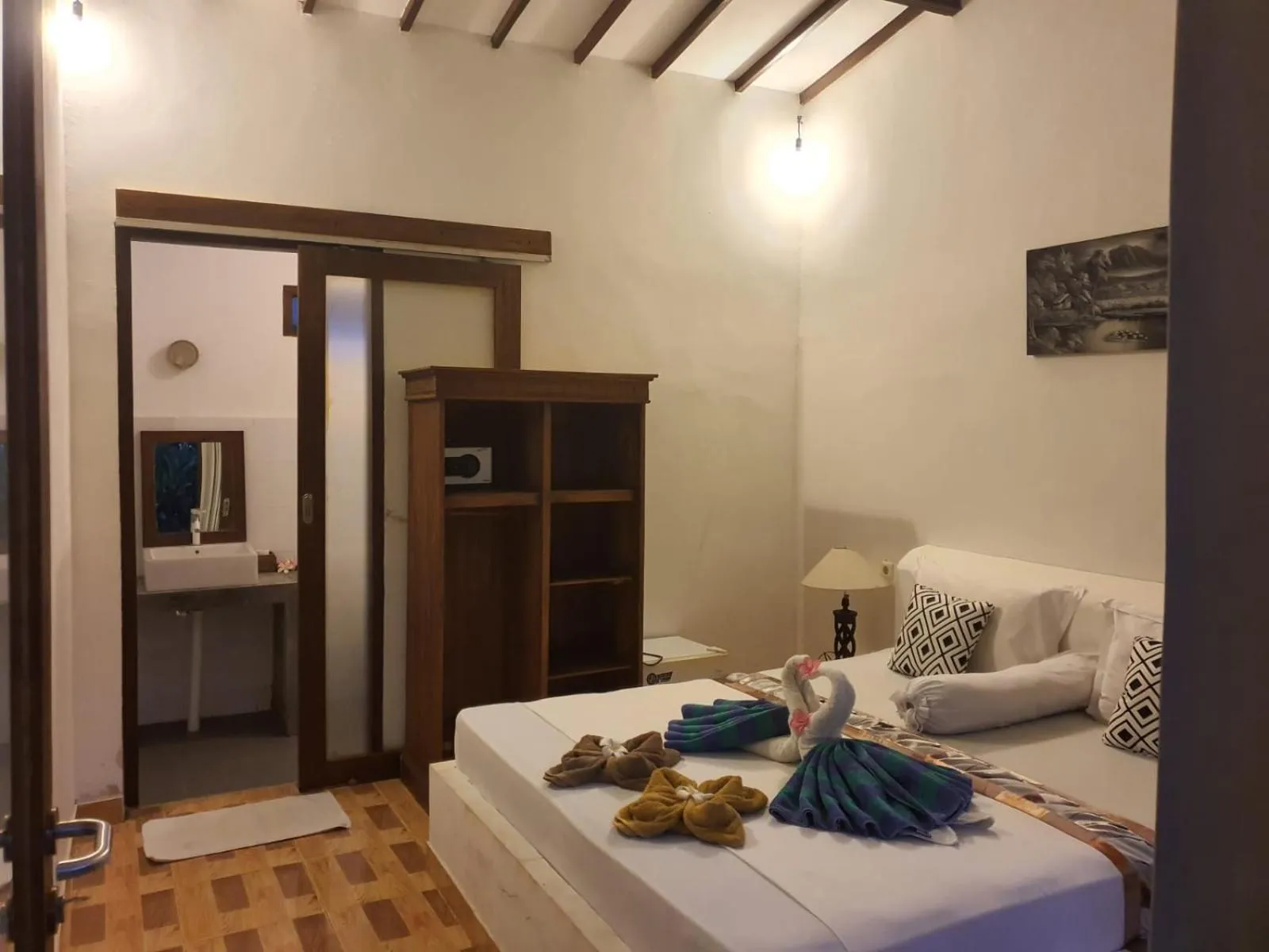 Bed in Palm Trees Villas