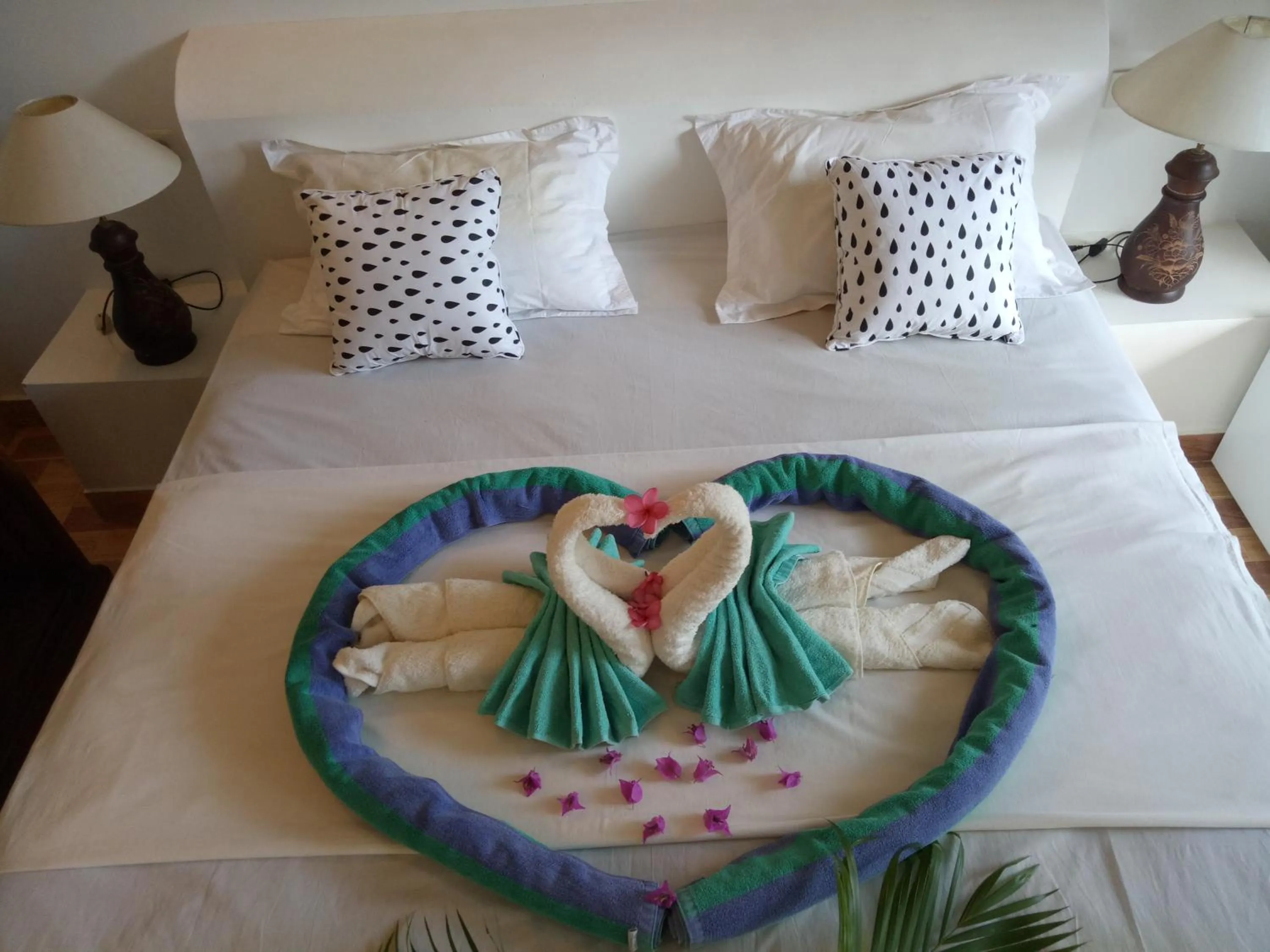 Bed in Palm Trees Villas