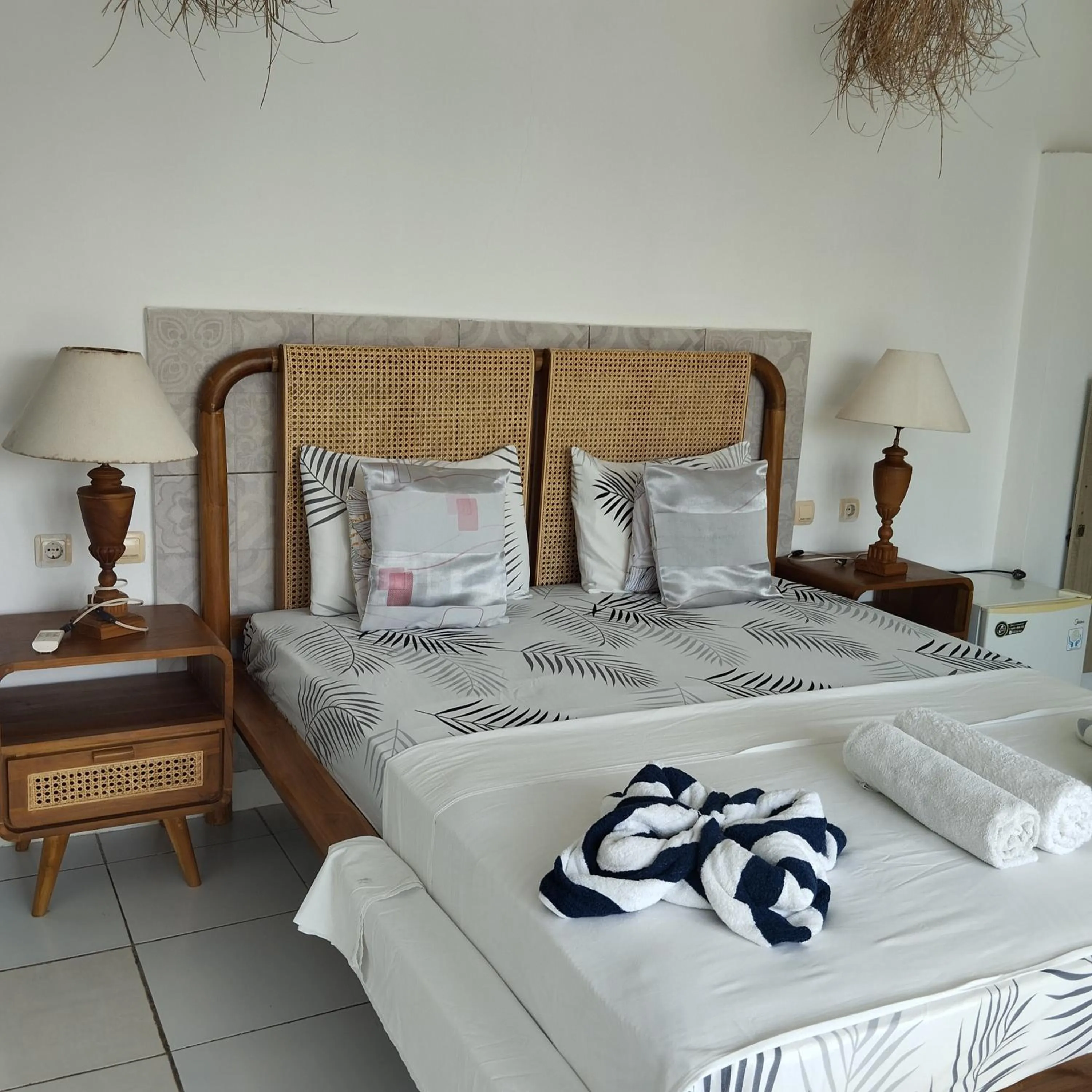 Bed in Palm Trees Villas