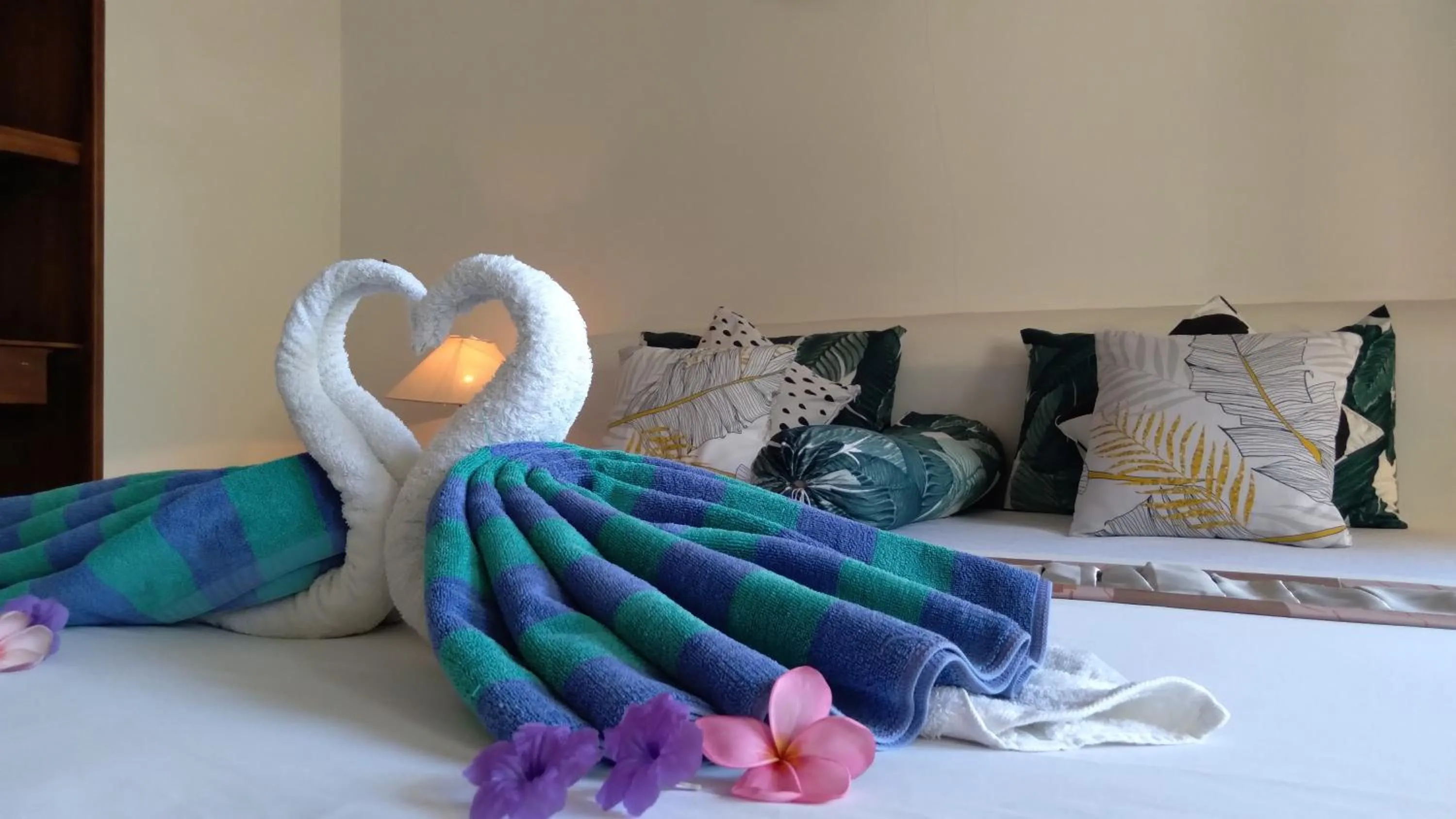 Bed in Palm Trees Villas