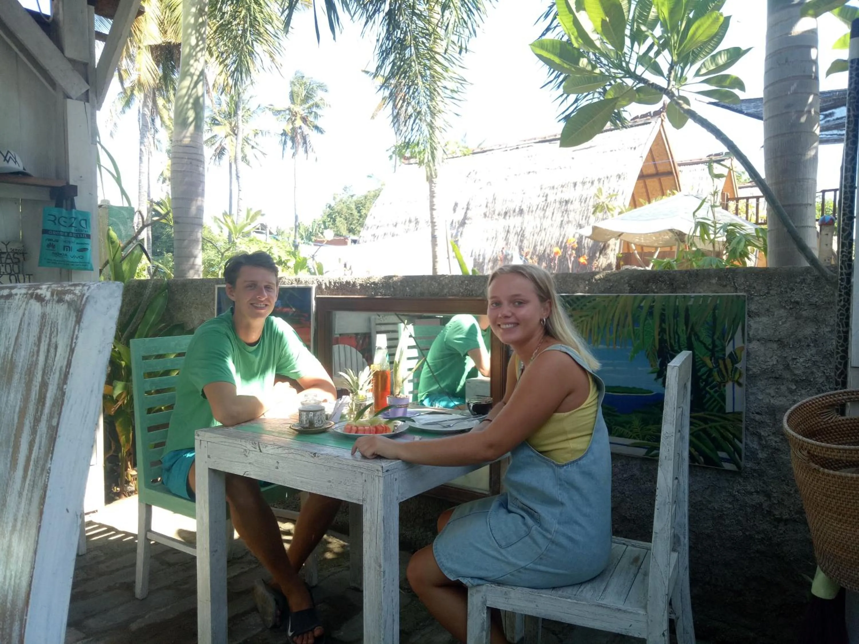 People in Palm Trees Villas