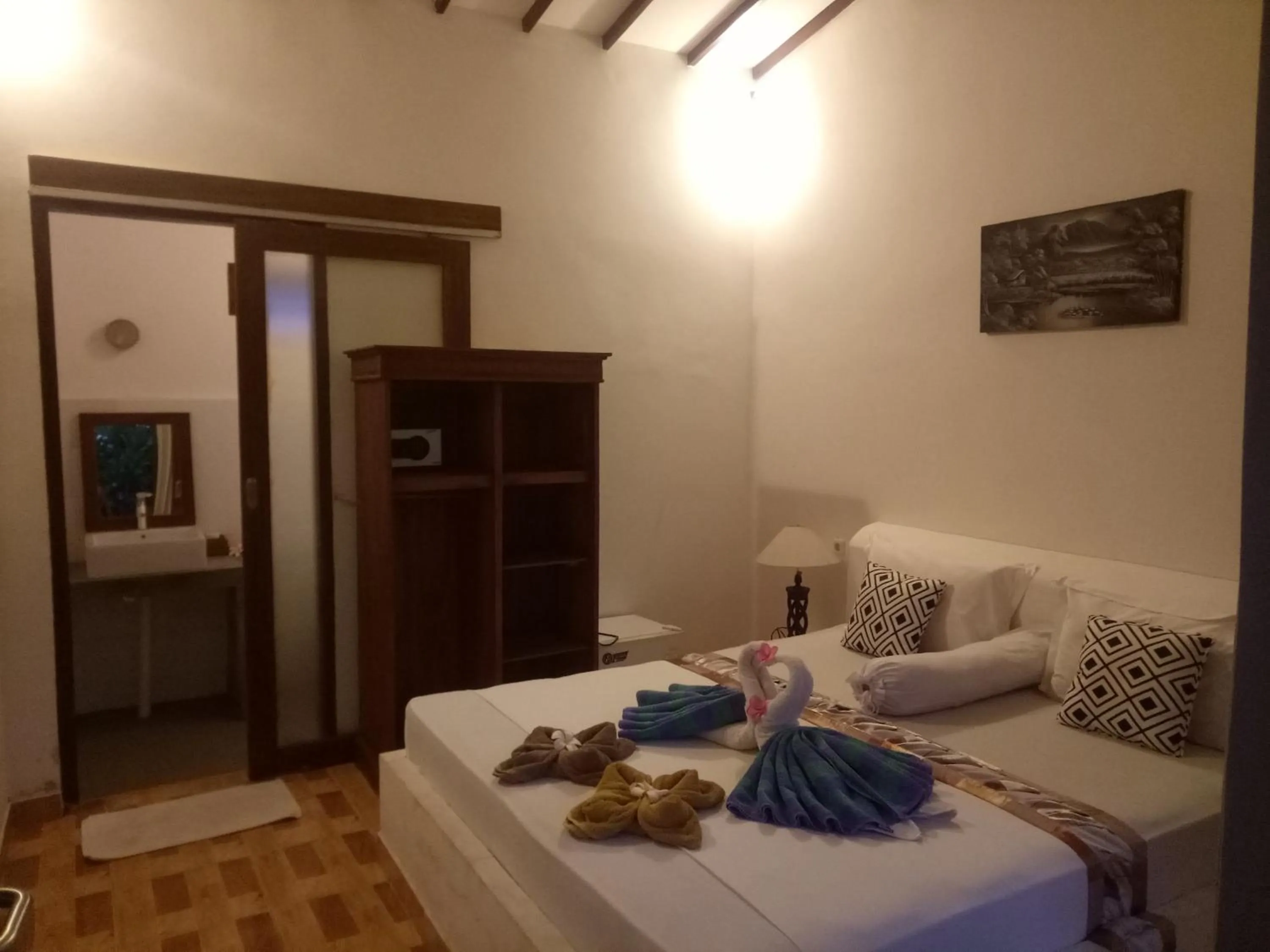 Bed in Palm Trees Villas