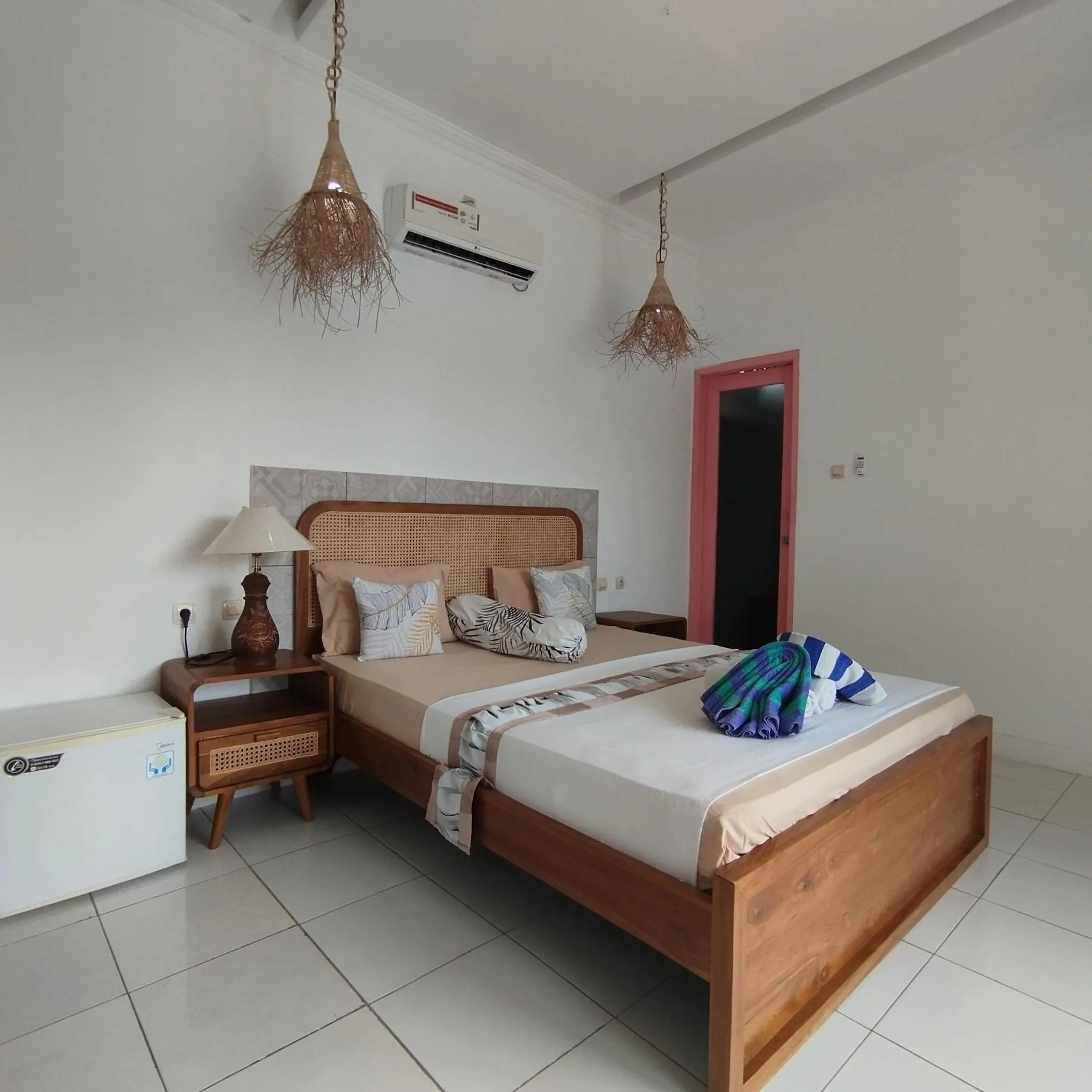 Bed in Palm Trees Villas