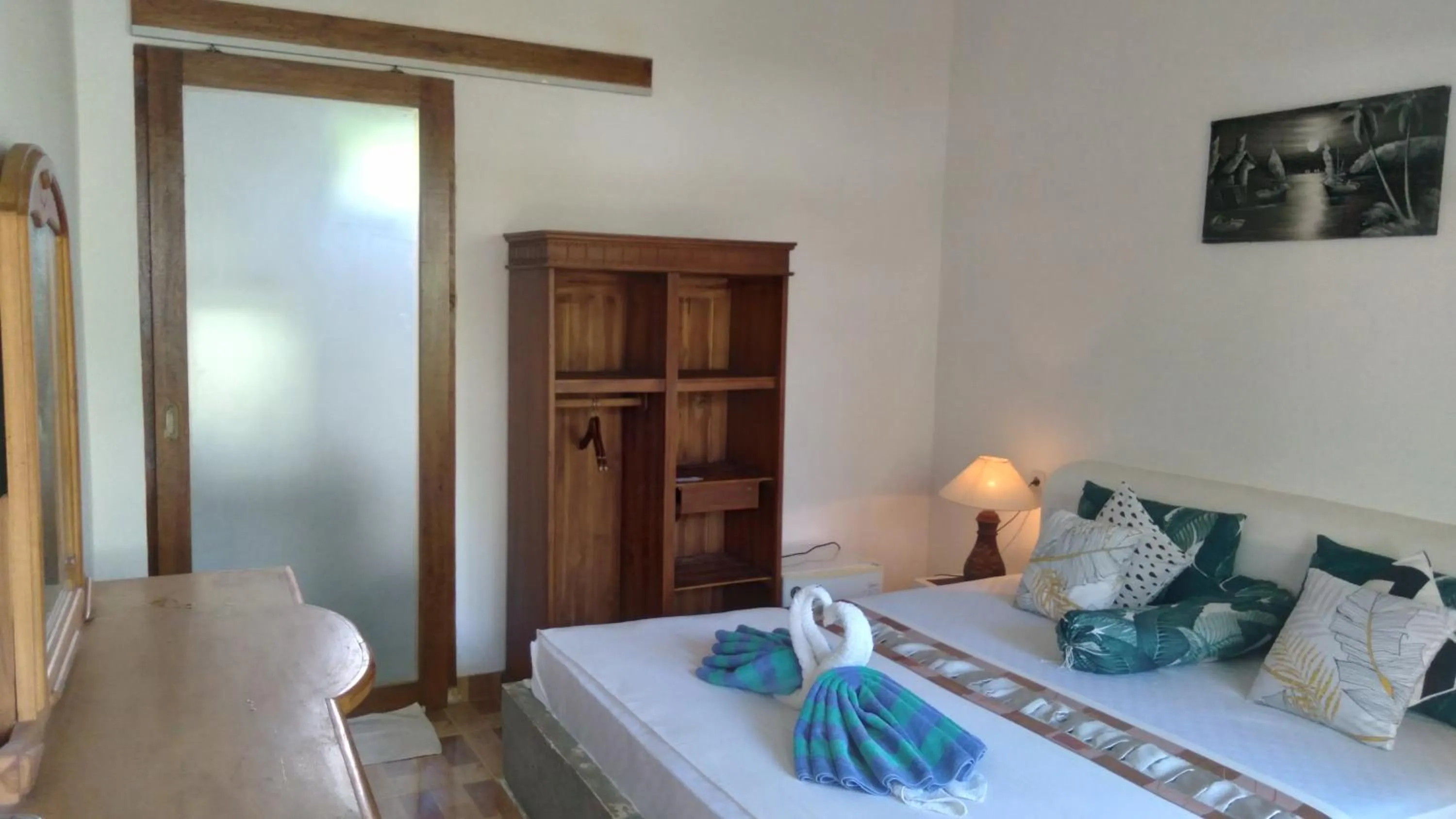 Bed in Palm Trees Villas