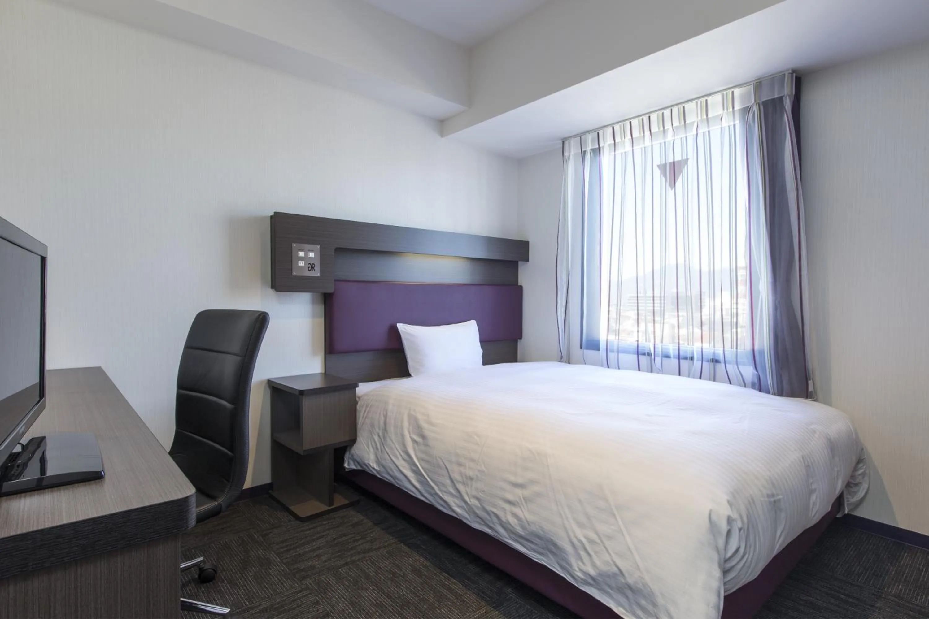 Bed in Green Rich Hotel Izumo (Artificial hot spring Futamata Yunohana)