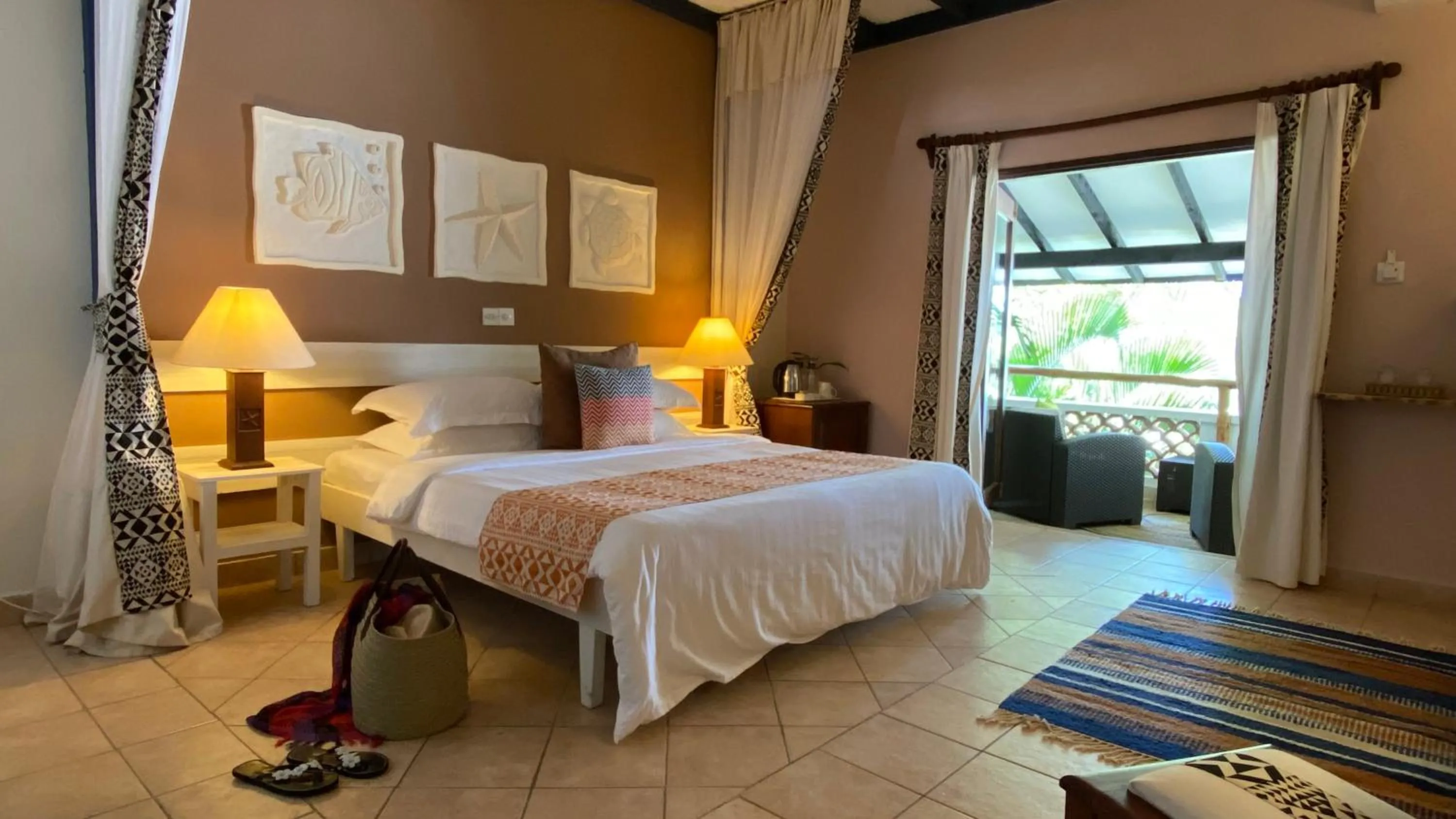 Bed in Pinewood Beach Resort and Spa