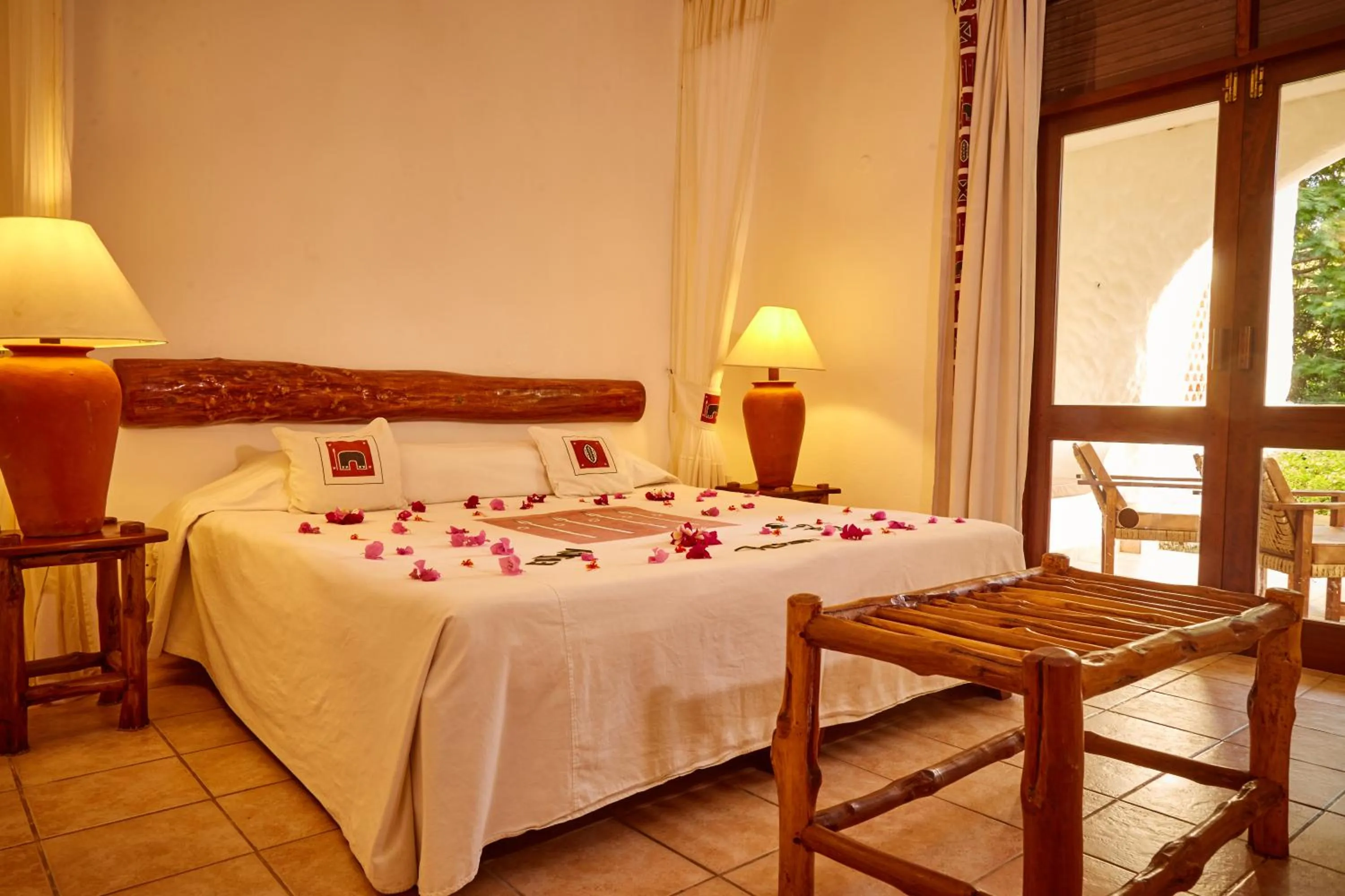 Bed in Pinewood Beach Resort and Spa