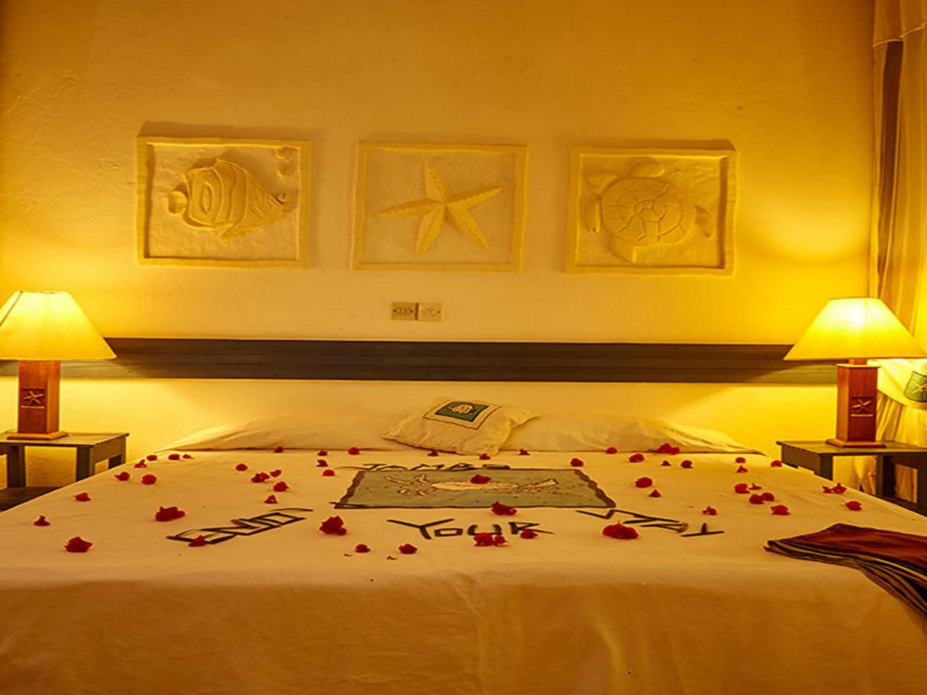 Bedroom, Bed in Pinewood Beach Resort and Spa