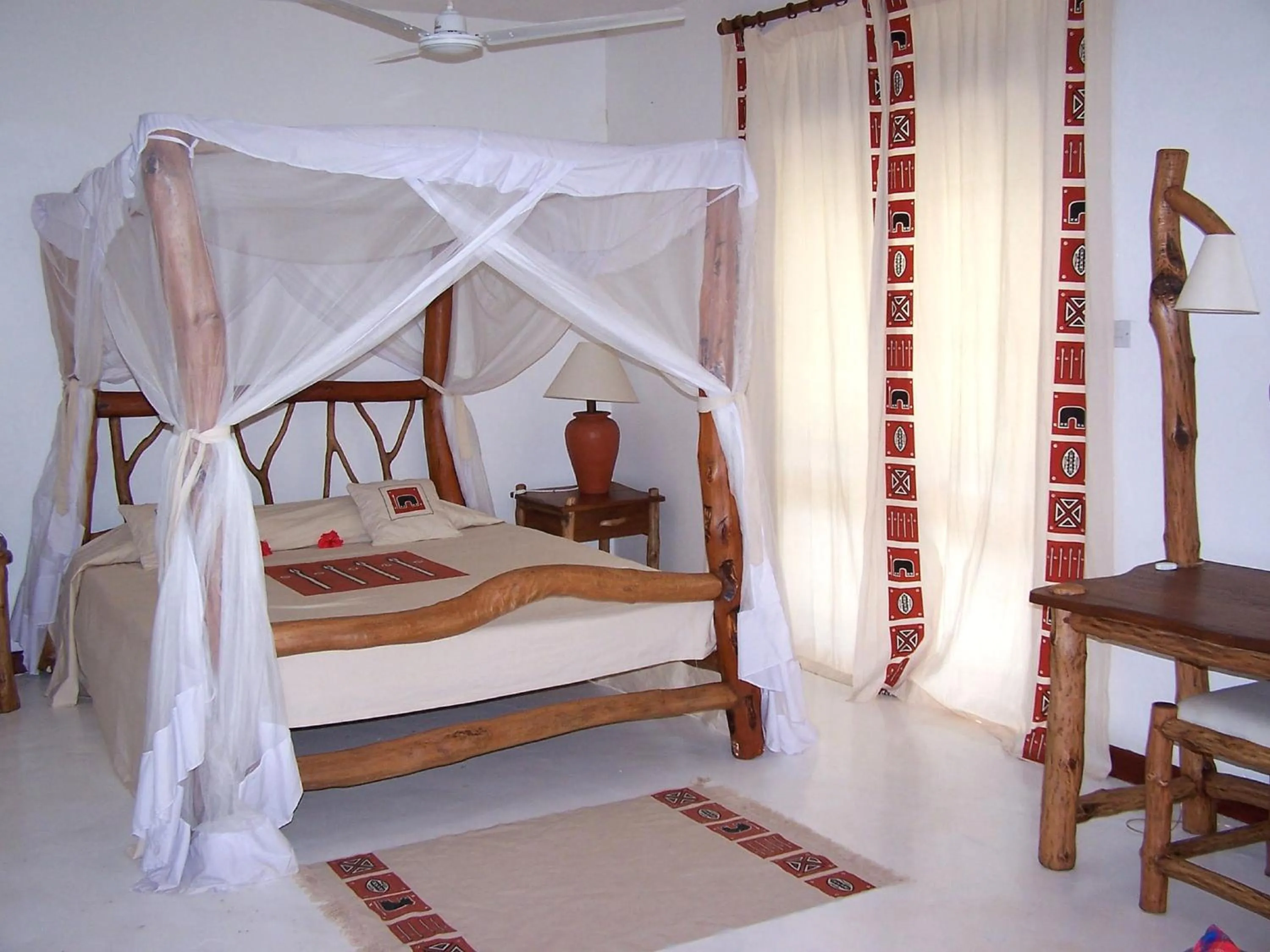 Bed in Pinewood Beach Resort and Spa