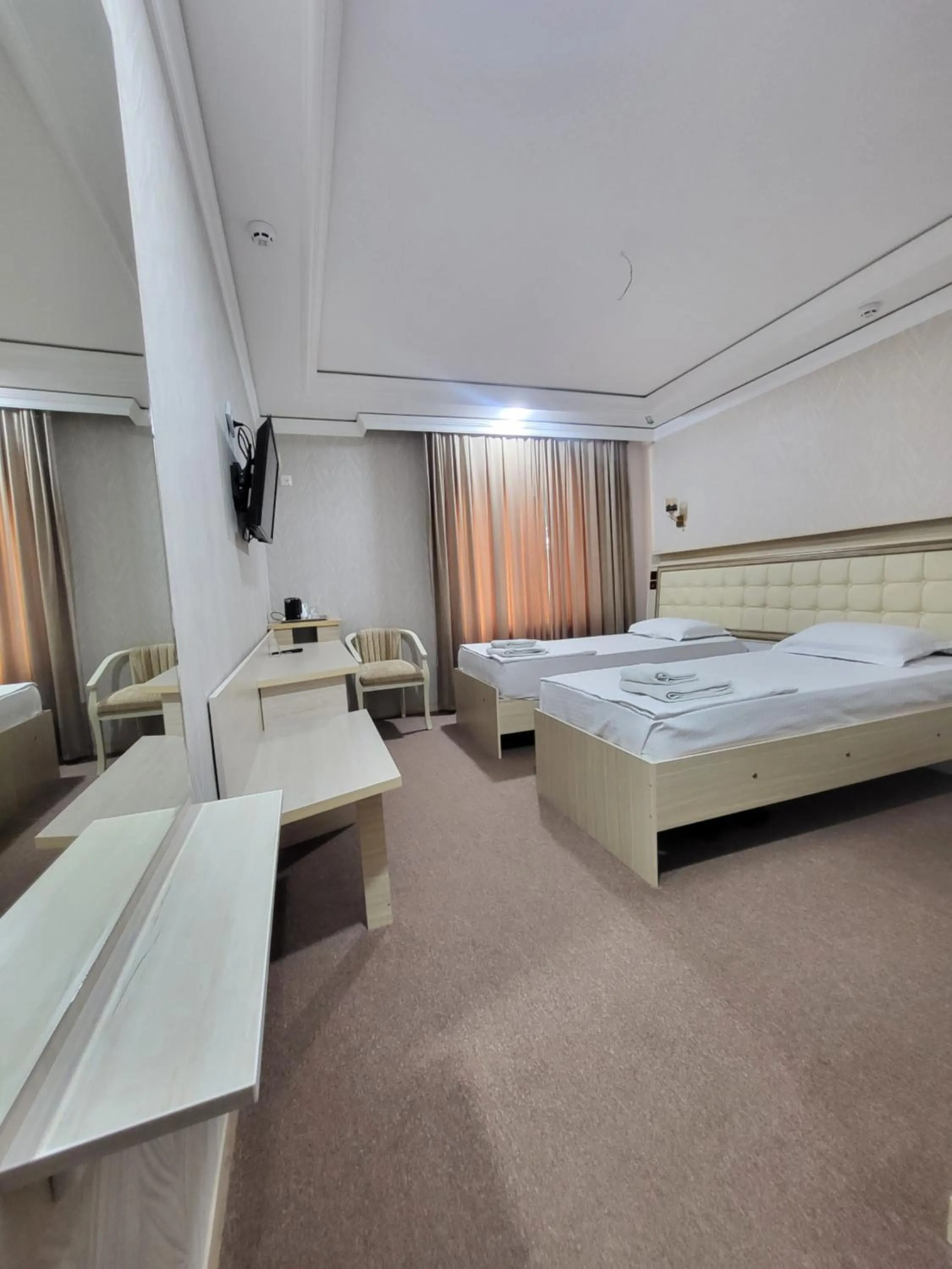 Bed in URGANCH Hotel