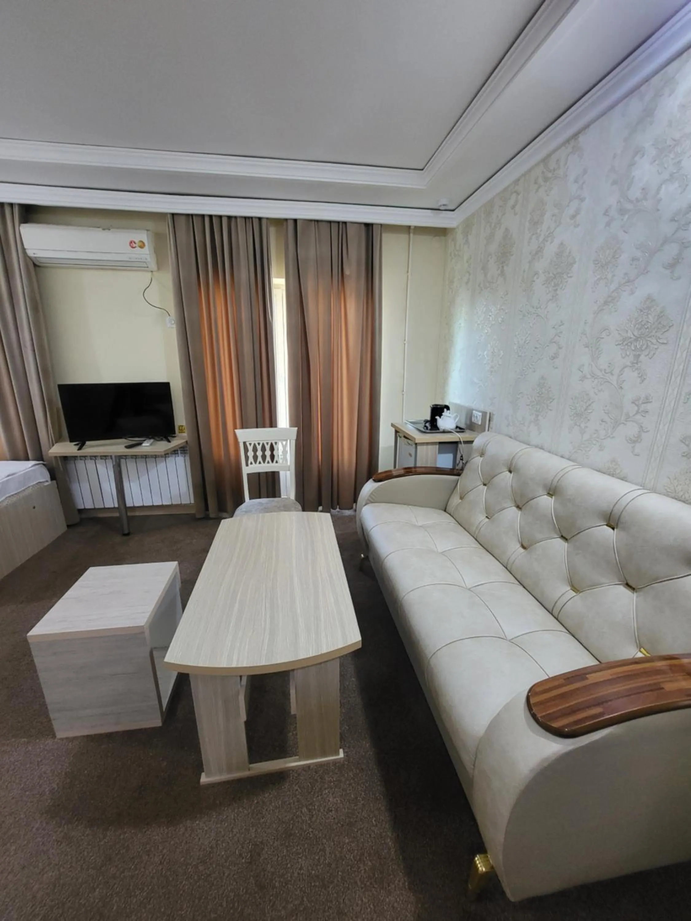 Bed in URGANCH Hotel