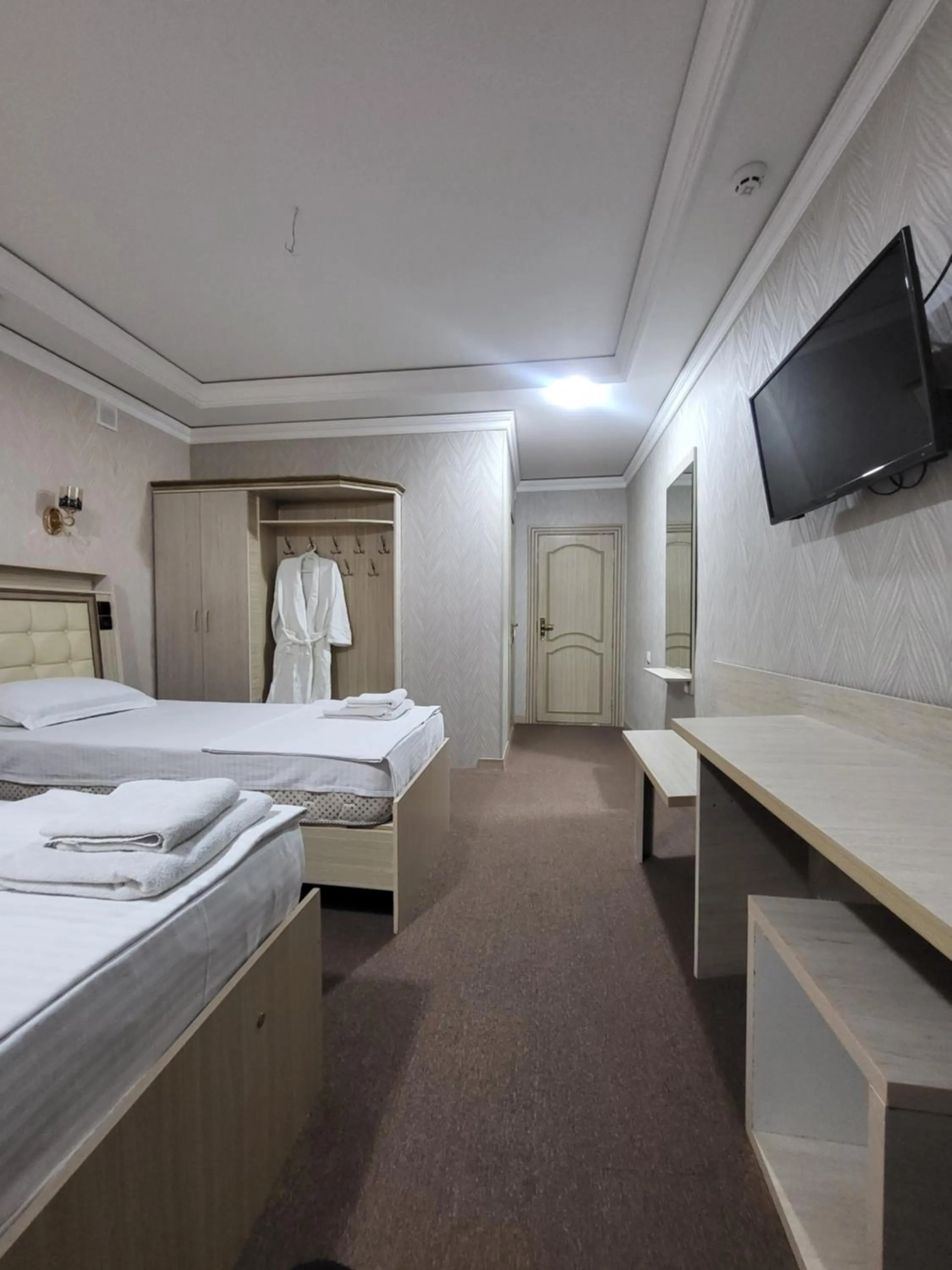 Bed in URGANCH Hotel