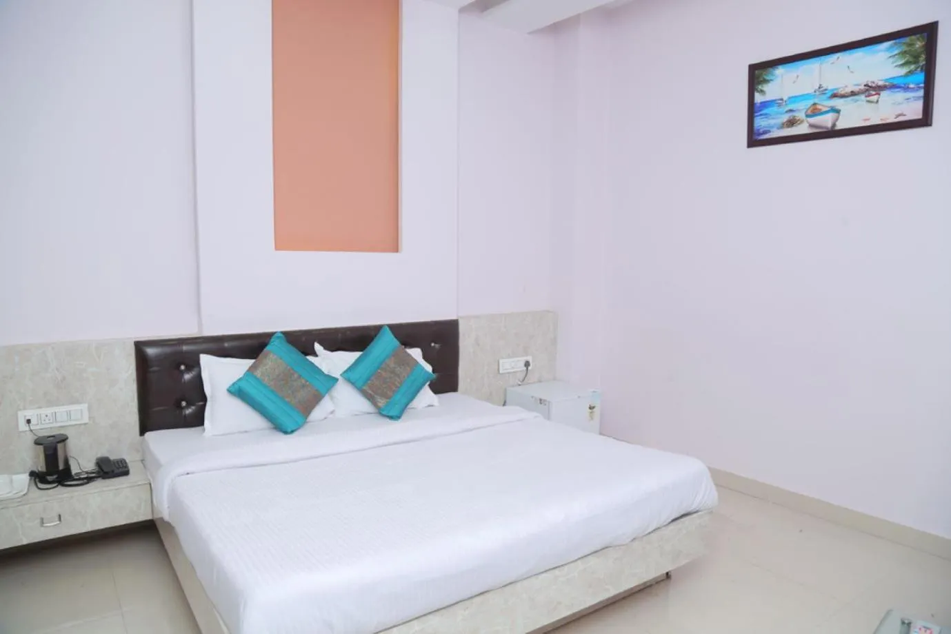 Bed in HOTEL GOLDEN DREAMS