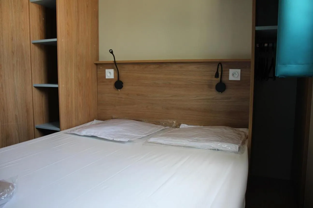 Bed in Camping Le Clos du Rhône