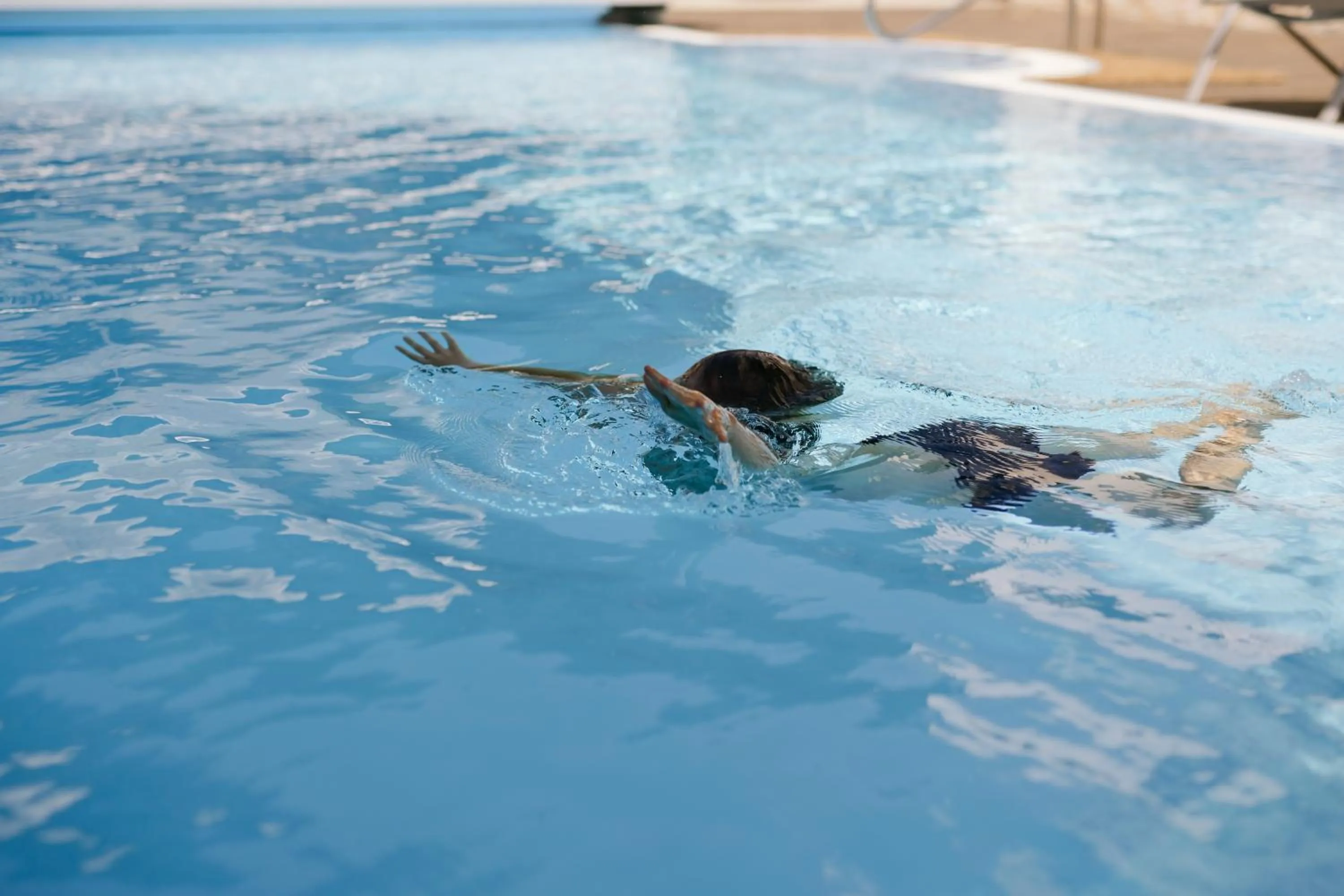 Swimming pool in Kinderhotel Laderhof