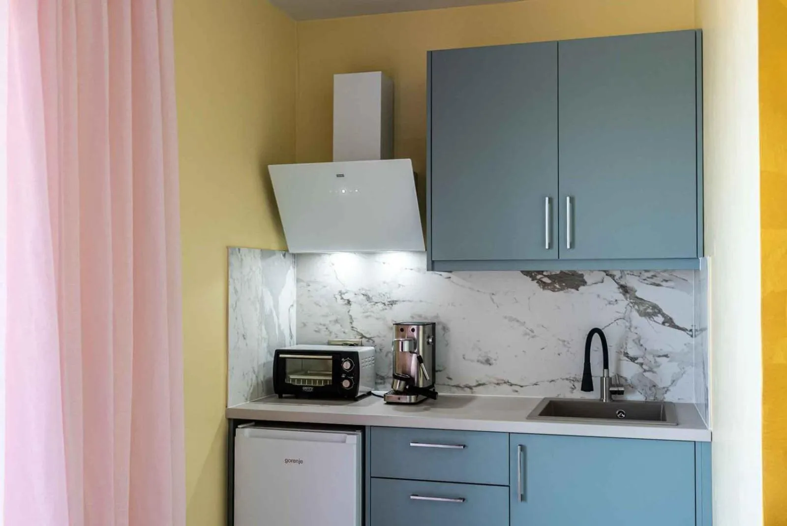 Kitchen or kitchenette in La Rêve Luxury Apartments with Private Jacuzzi