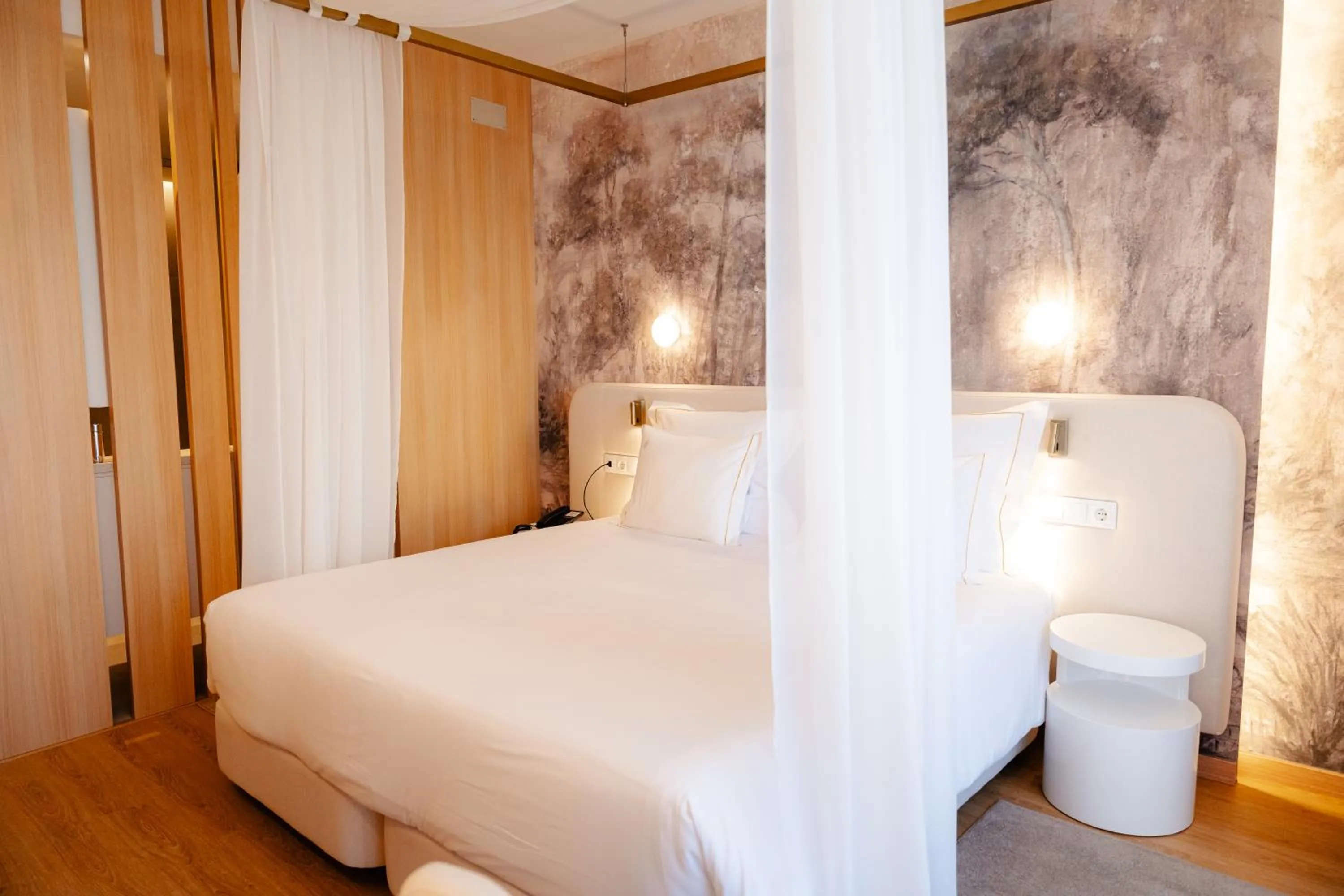 Bed in Lisotel - Hotel & Spa