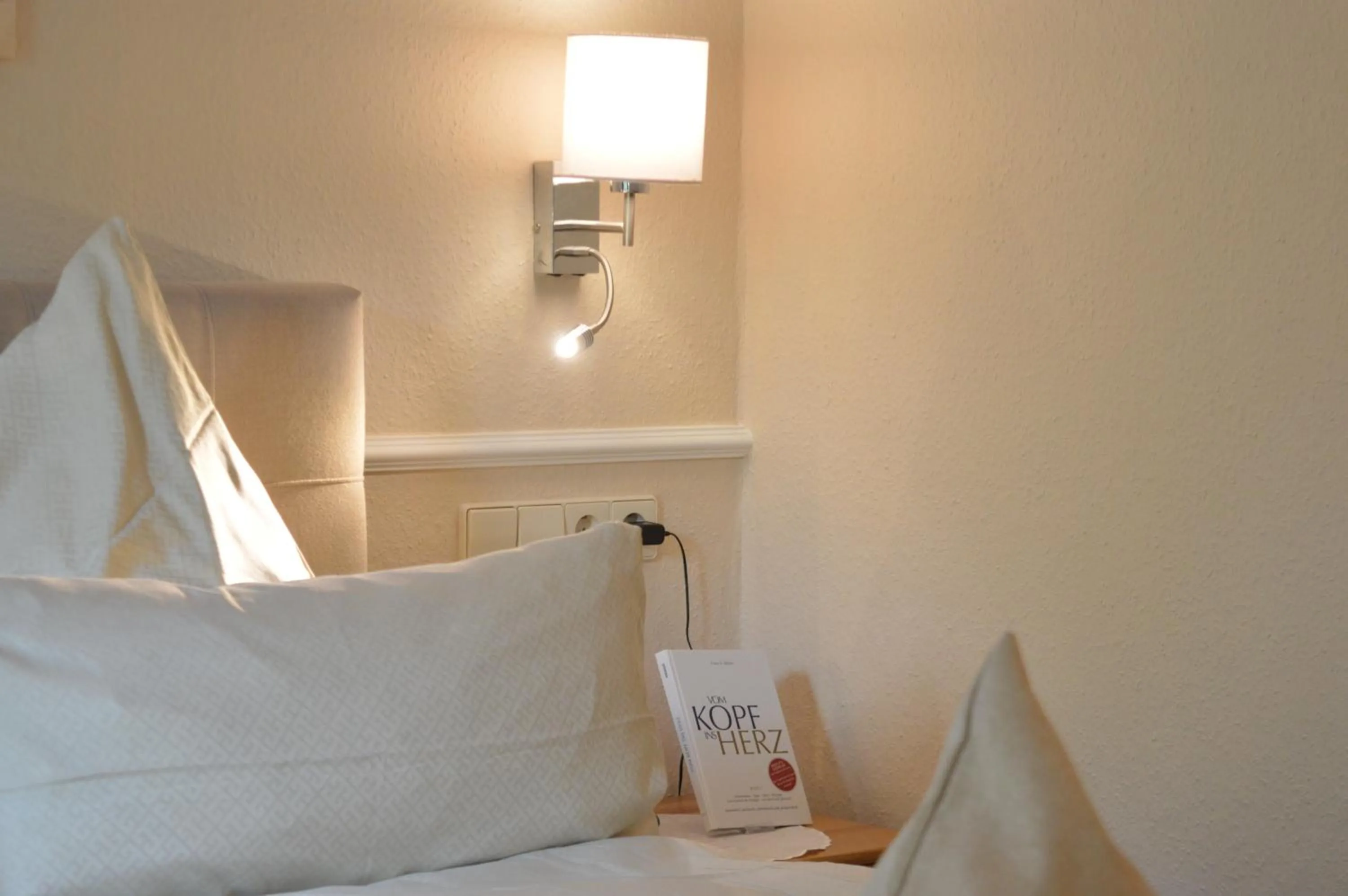 Bed in Landhaus Zum Heidewanderer mit THERMEplus