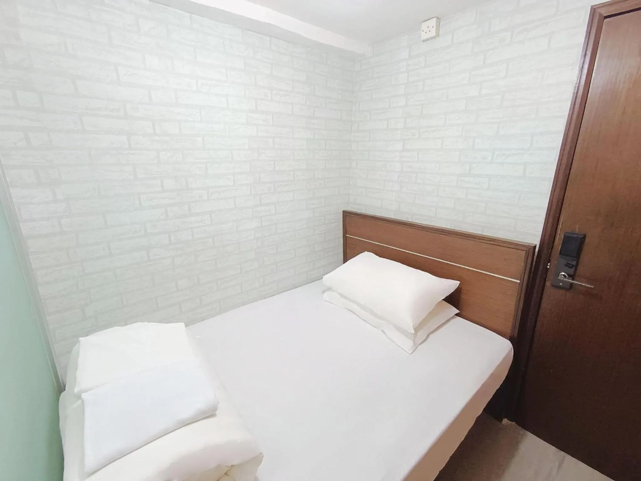 Bed in Tempo Inn West Kowloon HSR Station
