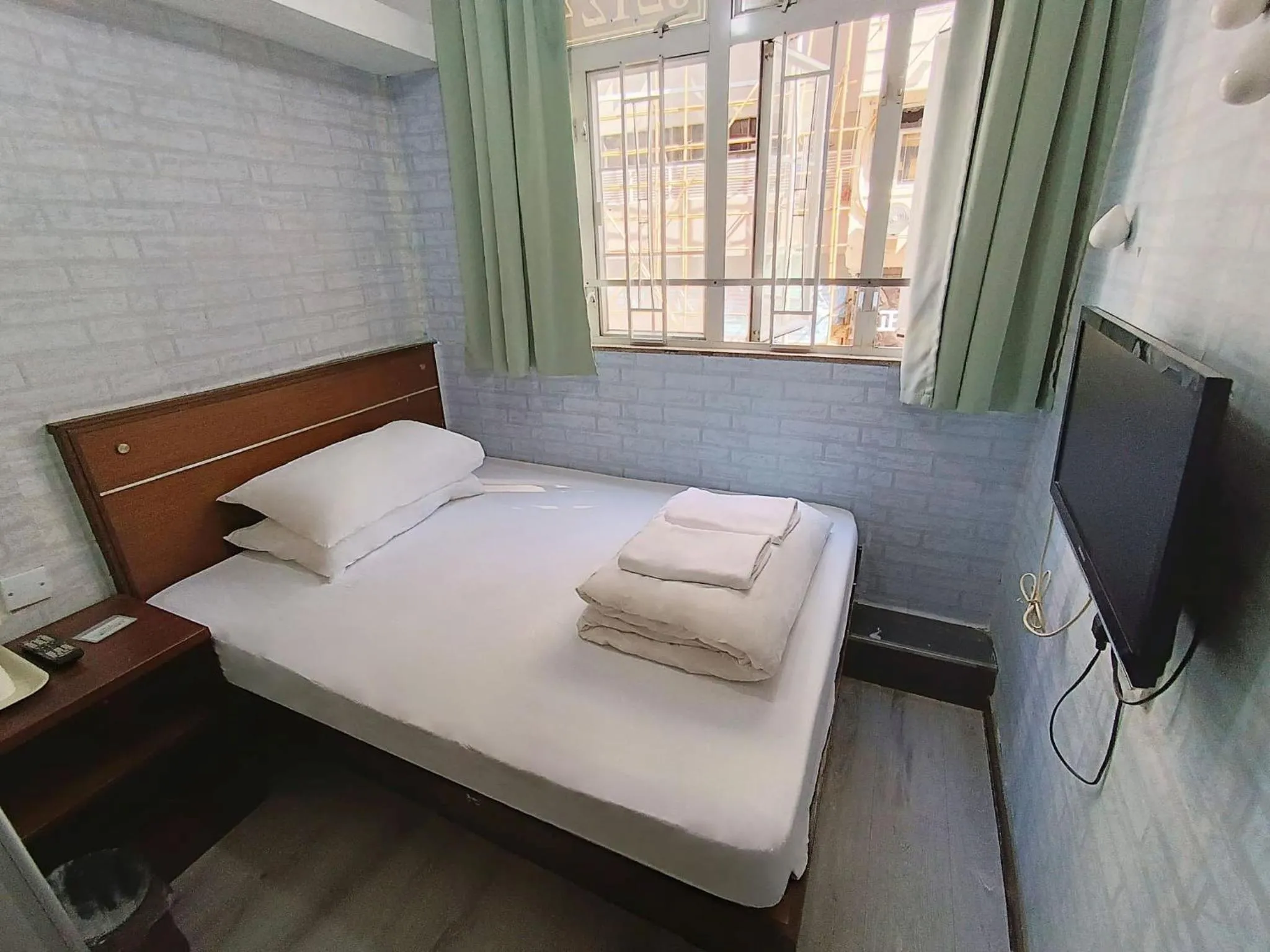 Bed in Tempo Inn West Kowloon HSR Station