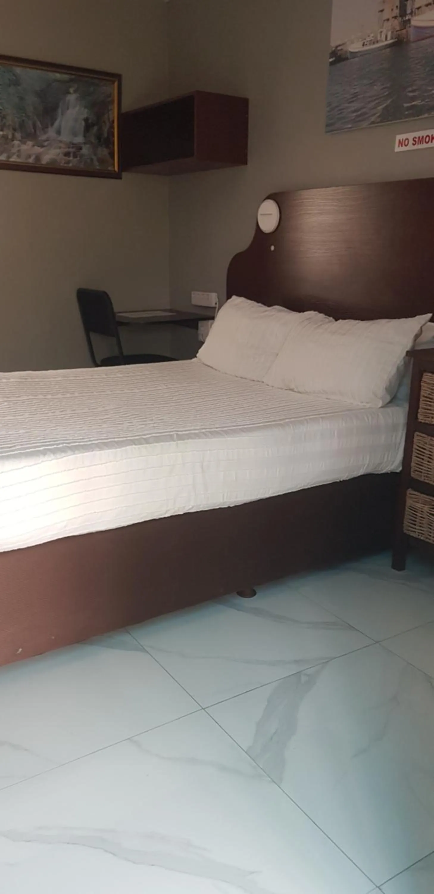 Bed in Rainbow Guest House and Tours