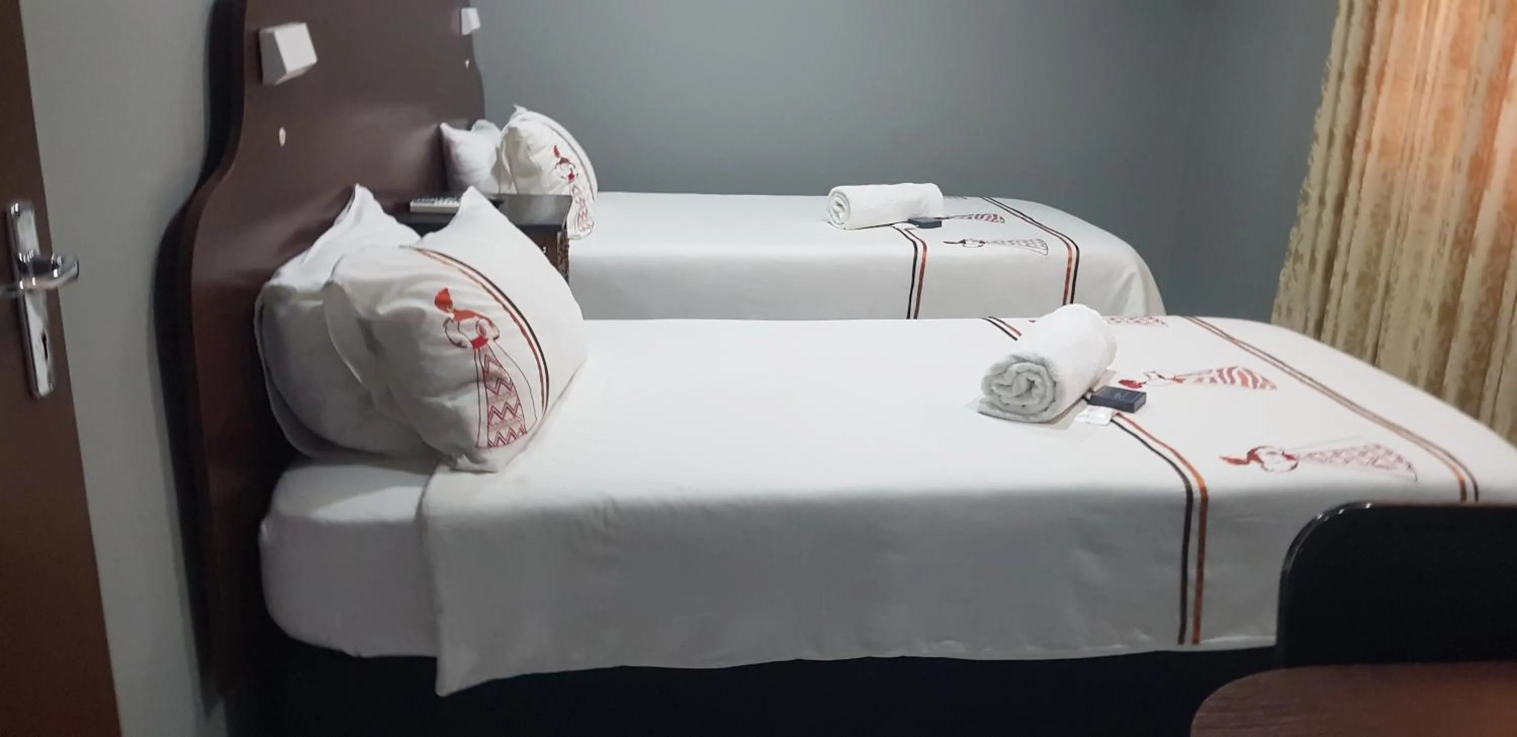 Bed in Rainbow Guest House and Tours