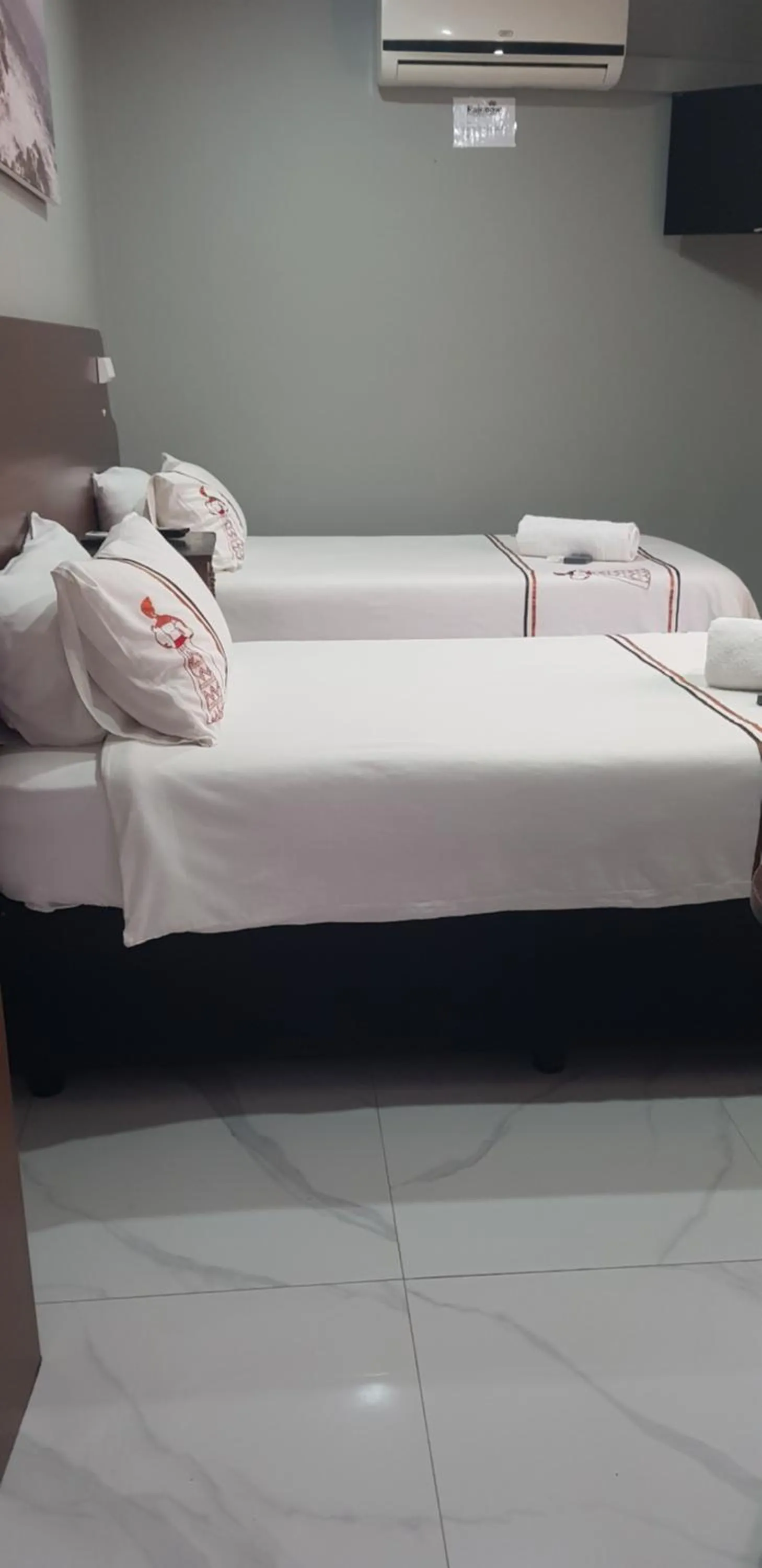 Bed in Rainbow Guest House and Tours