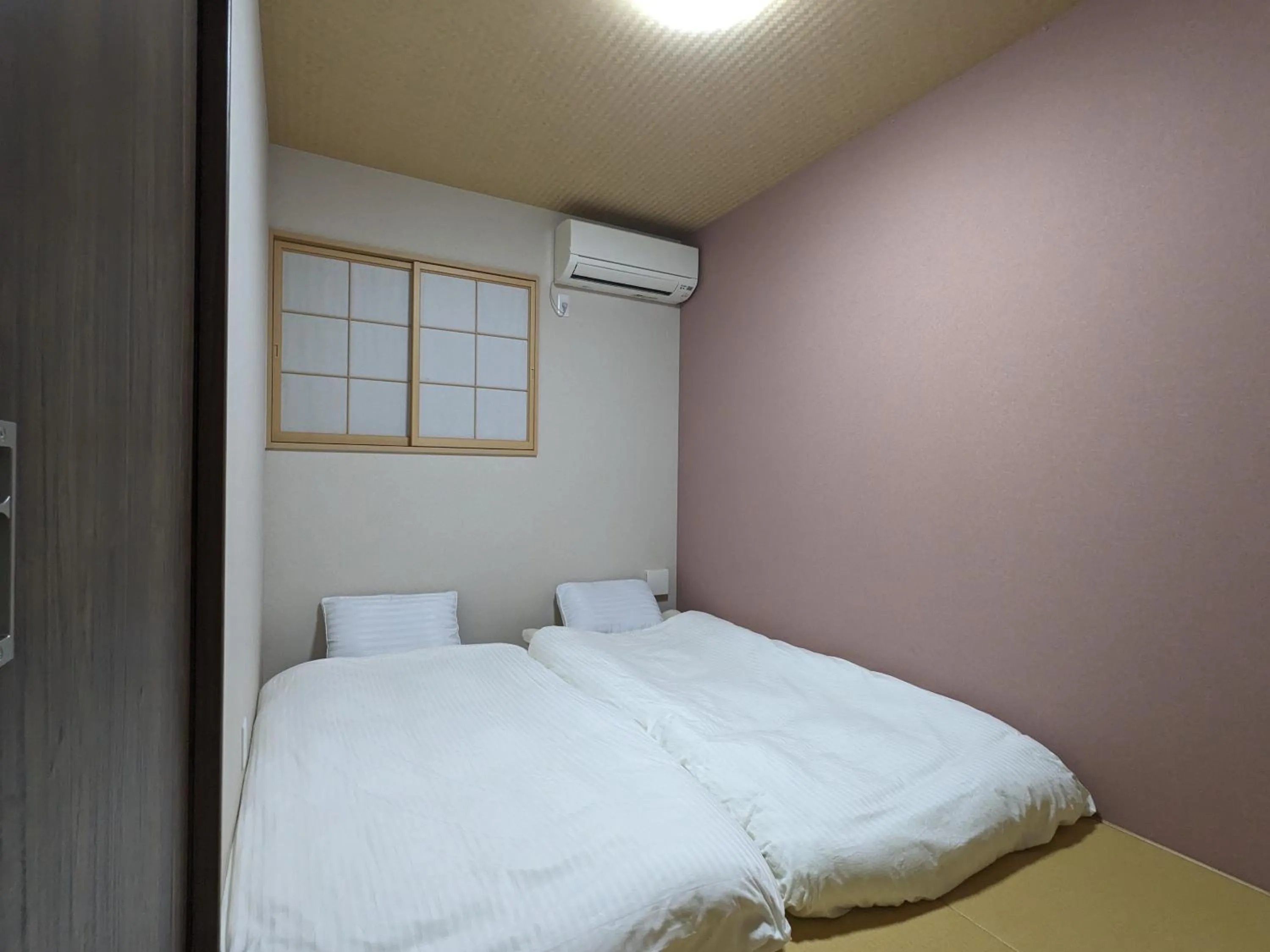 Bed in Moonlight Inn Kujo