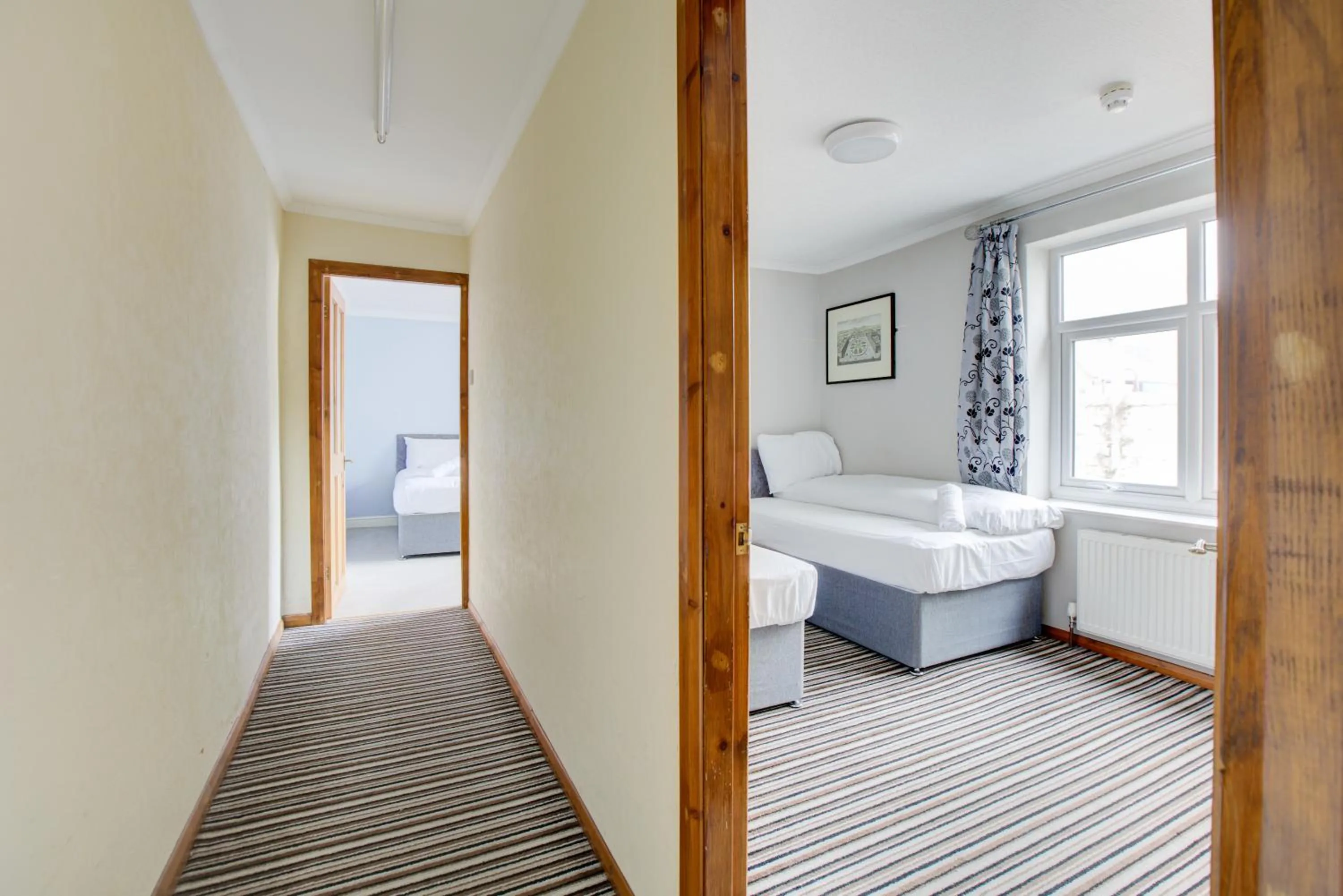 Bedroom, Bed in The Sandringham Court Hotel & Apartment Welcoming Large and Small Groups for 15 years