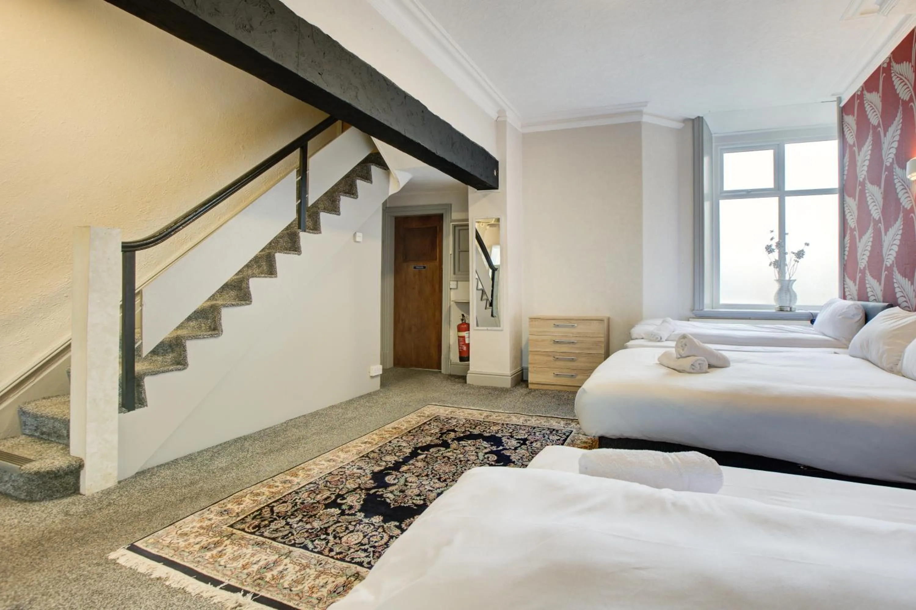 Bedroom, Bed in The Sandringham Court Hotel & Apartment Welcoming Large and Small Groups for 15 years