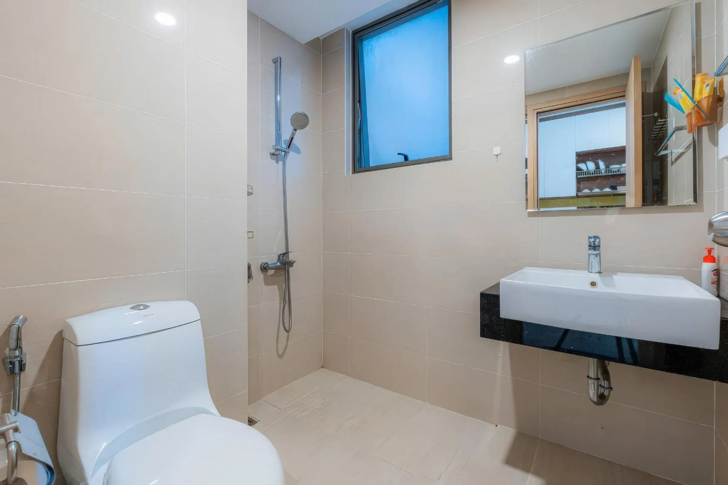 Shower in Minute Suites - Botanica Orchard TSN Airport