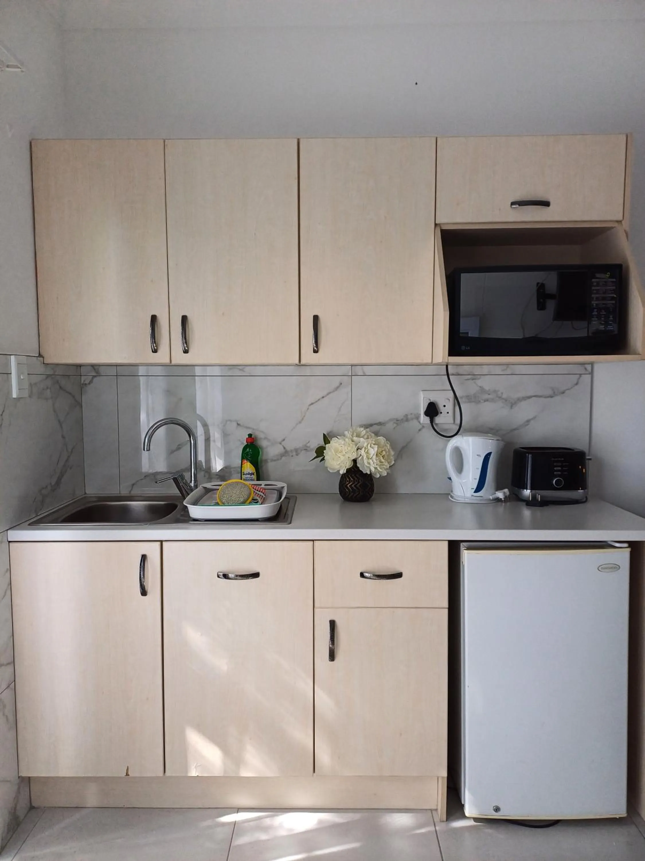 Kitchen or kitchenette in Capbon Guesthouse