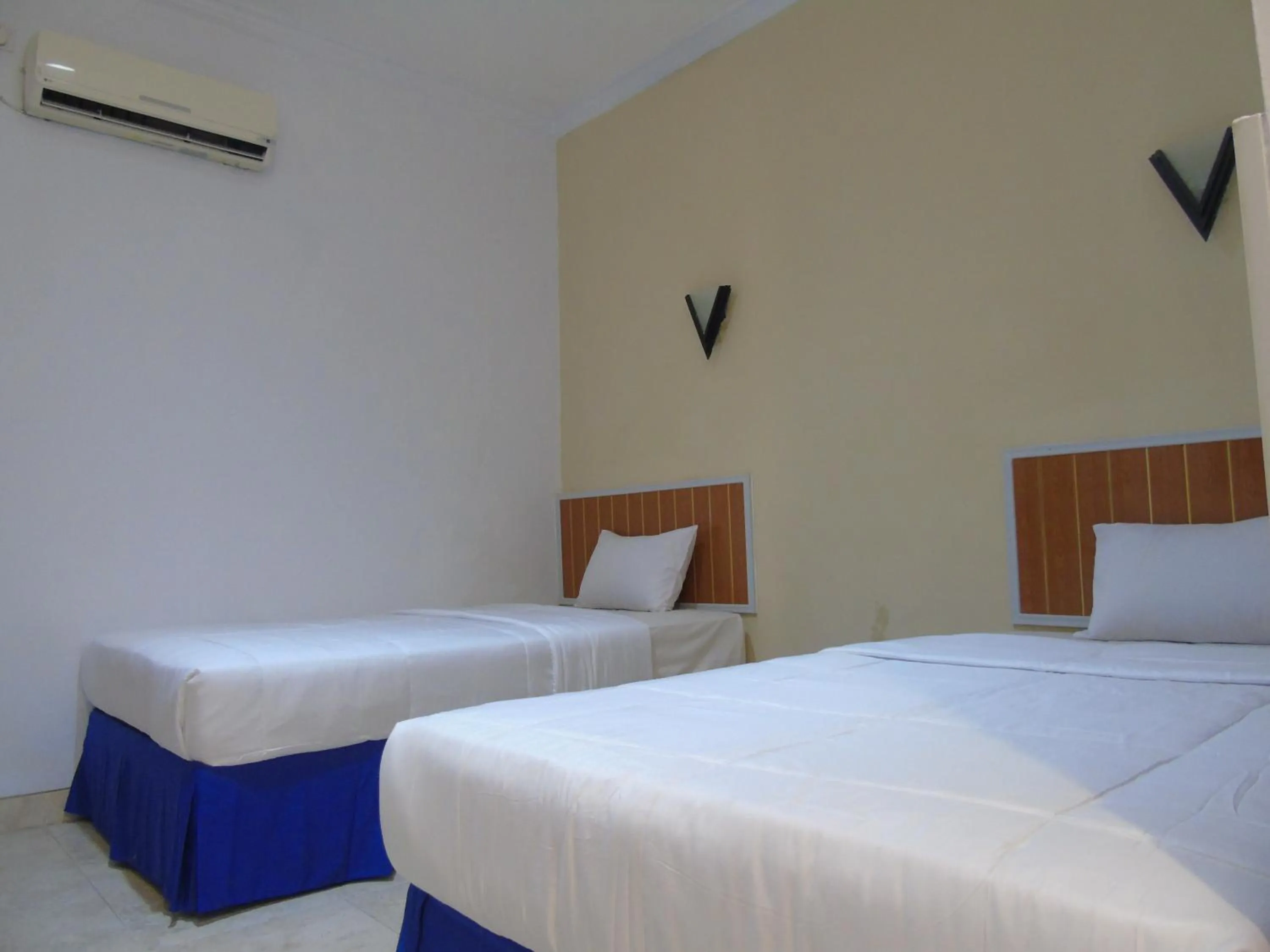 Bed in Hotel Permata Zamrud