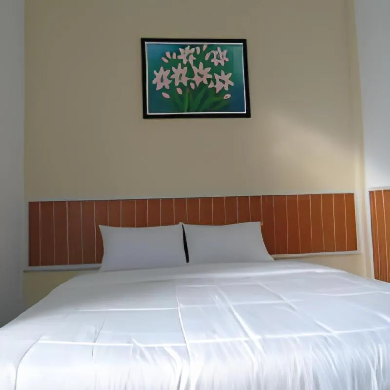 Bed in Hotel Permata Zamrud