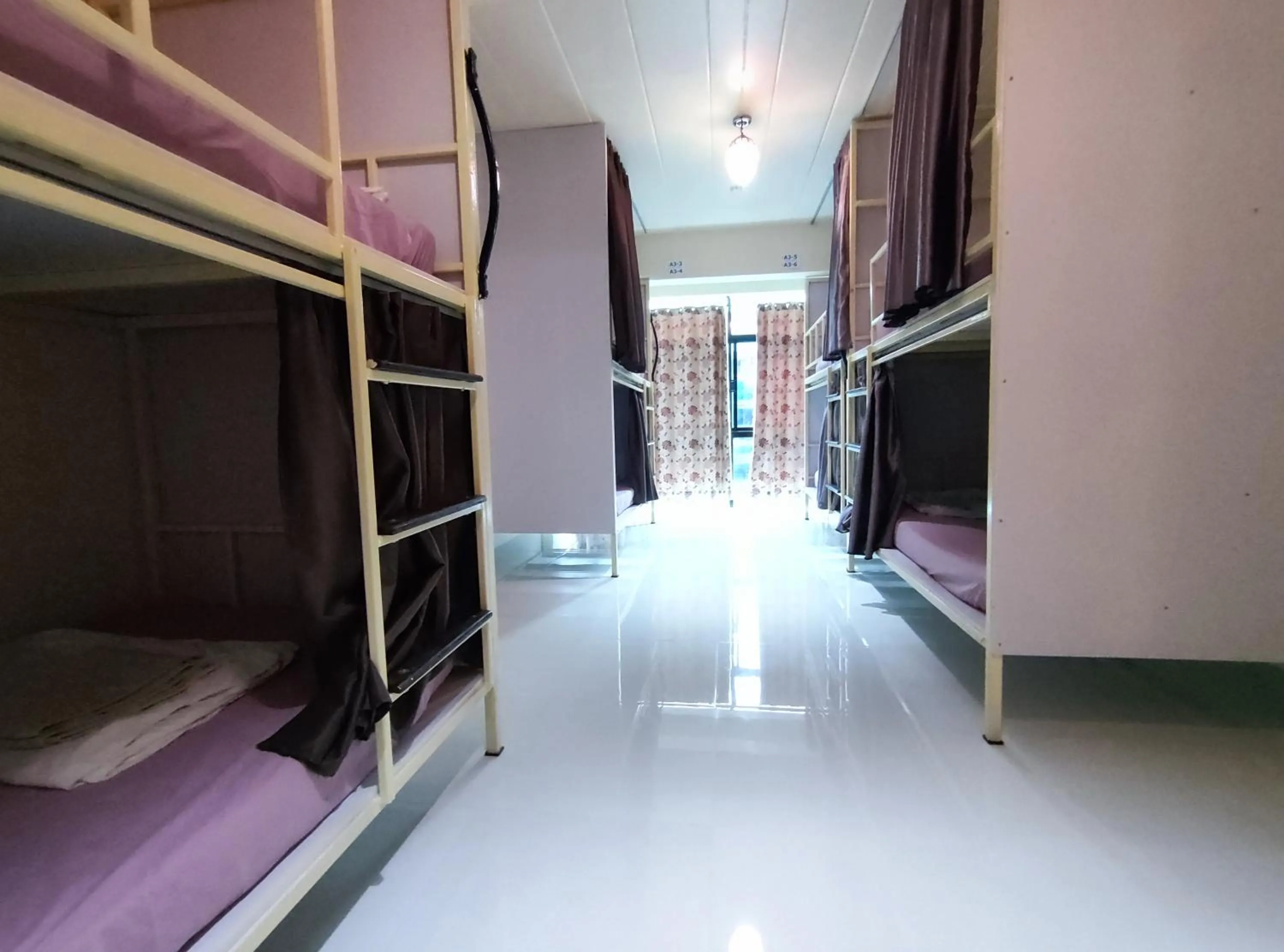 Bed in 168 Chiangmai Guesthouse