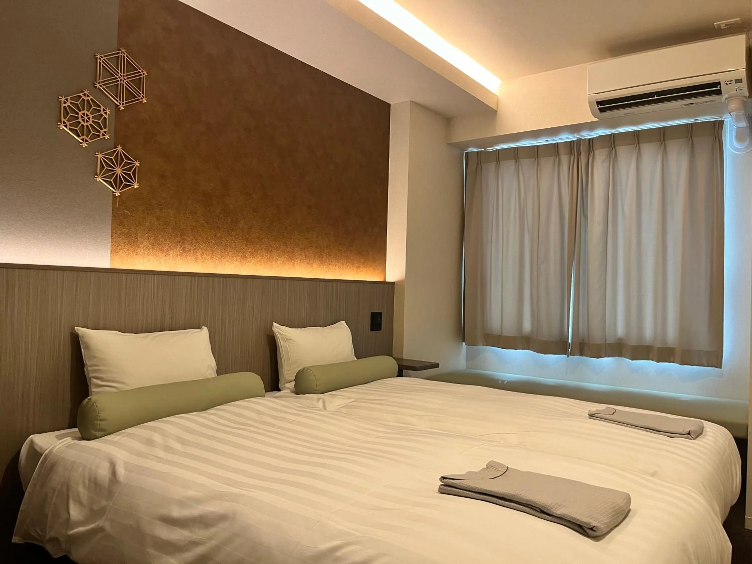 Bed in Hotel Japanesque Kyoto Station ZEQUU