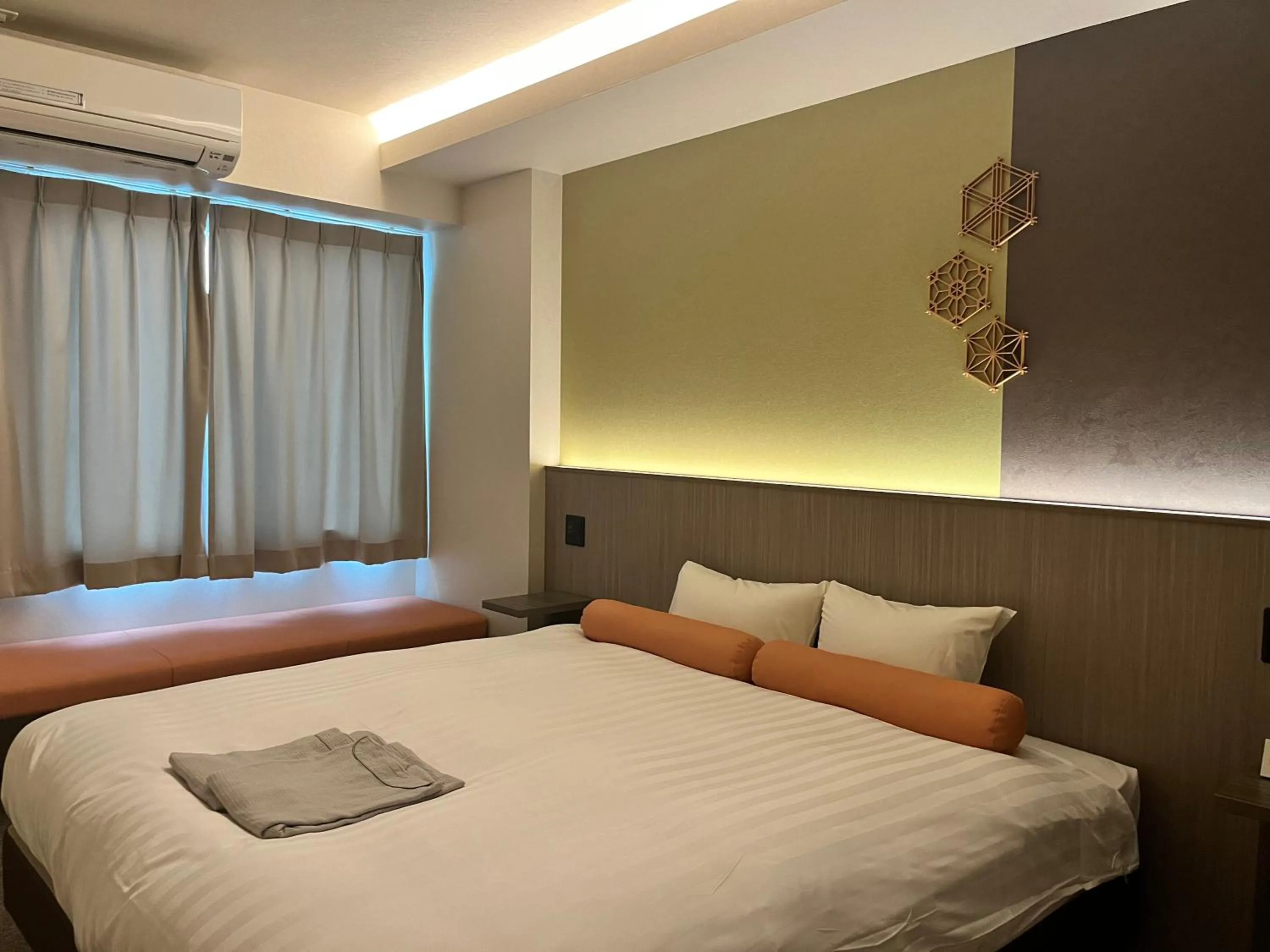 Bed in Hotel Japanesque Kyoto Station ZEQUU