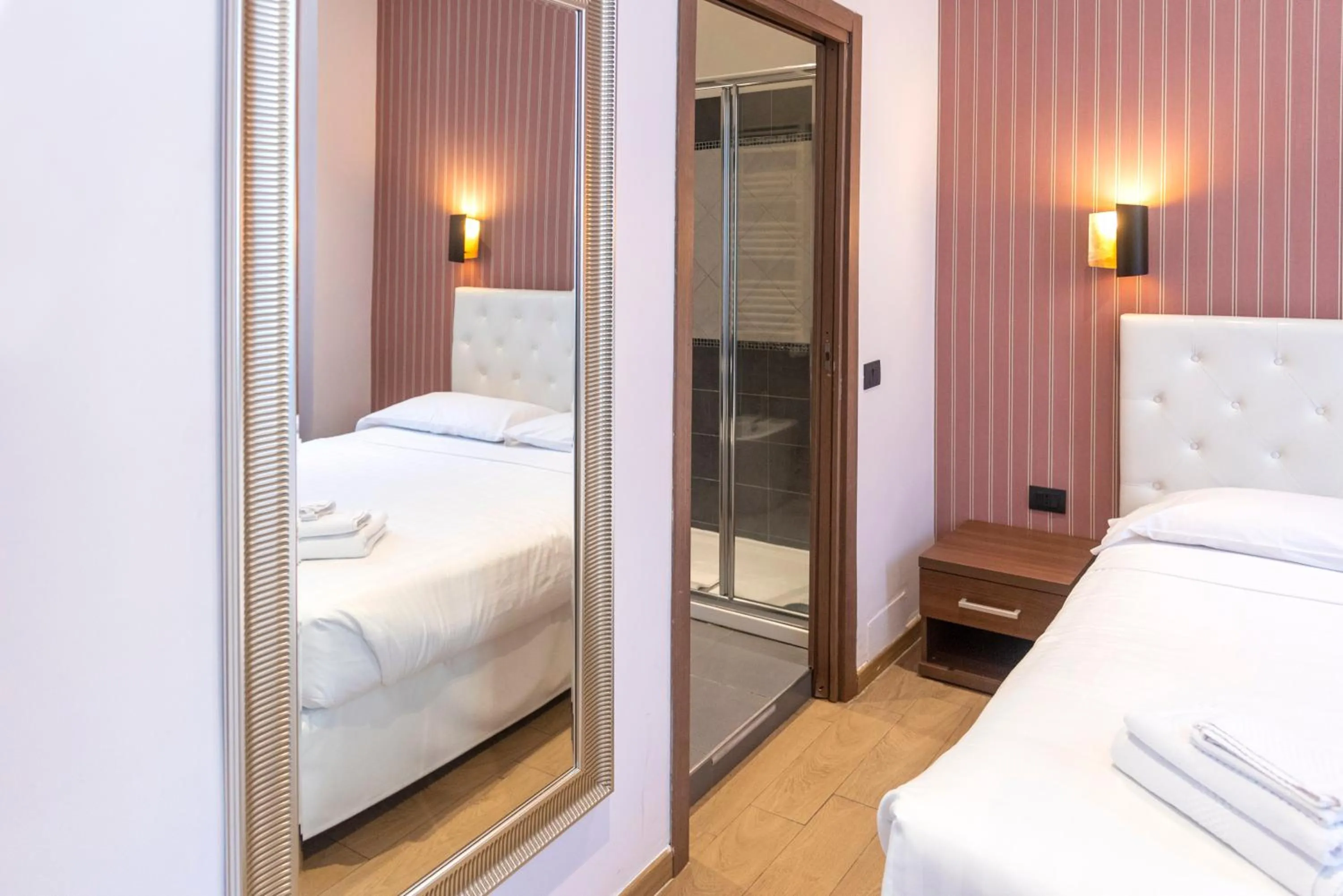 Bed in La Grande Bellezza Guest House Rome