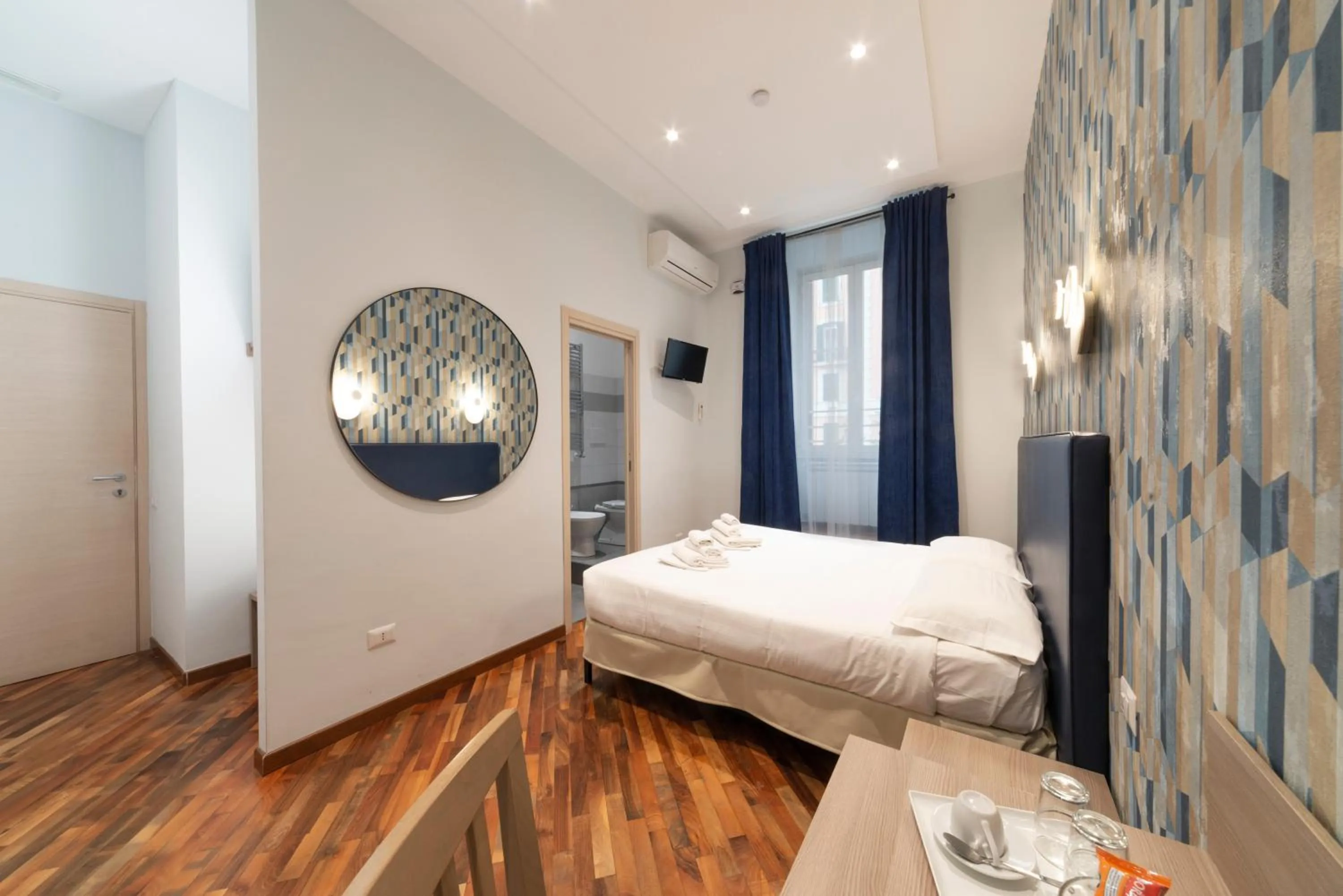 Bed in La Grande Bellezza Guest House Rome