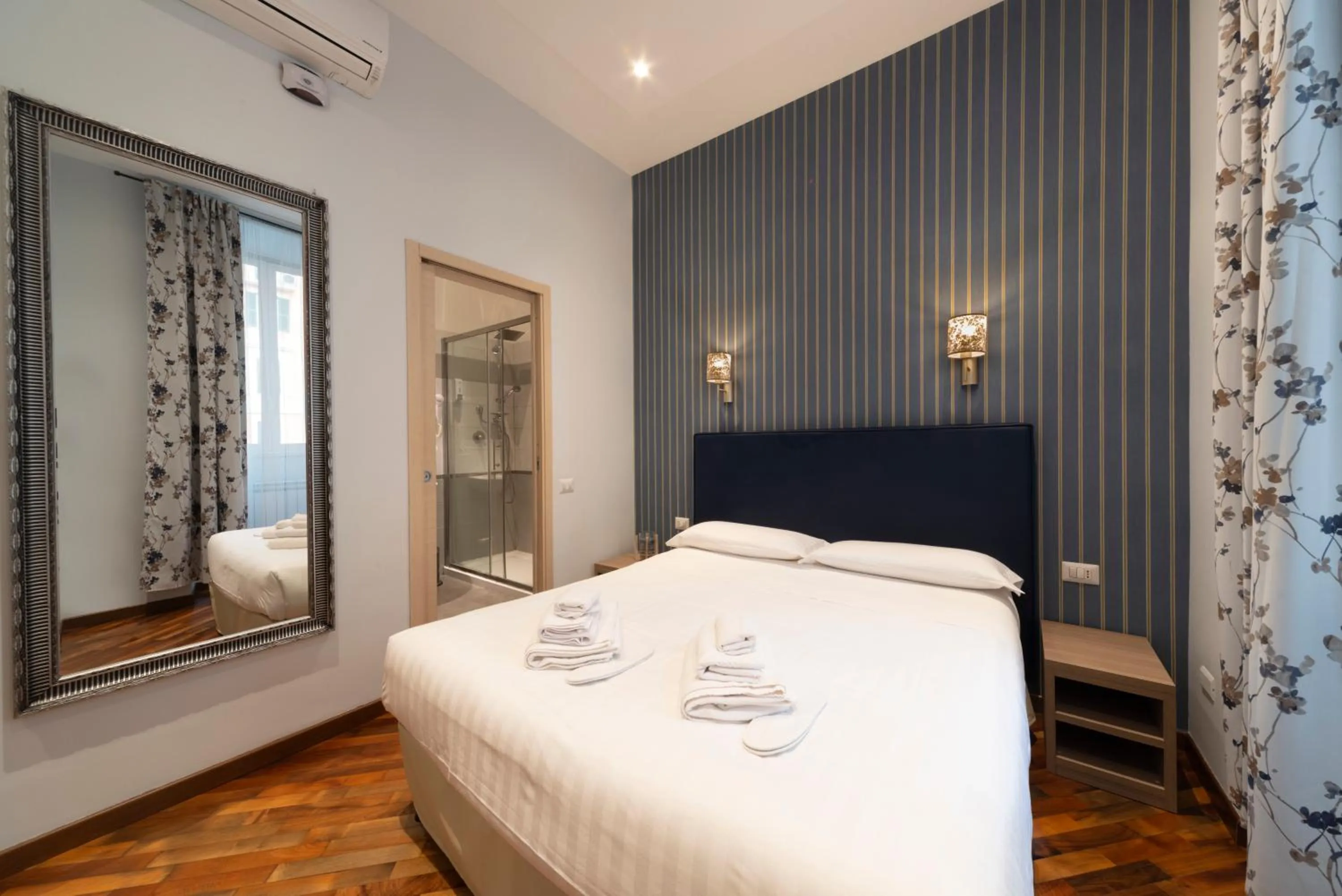 Bed in La Grande Bellezza Guest House Rome