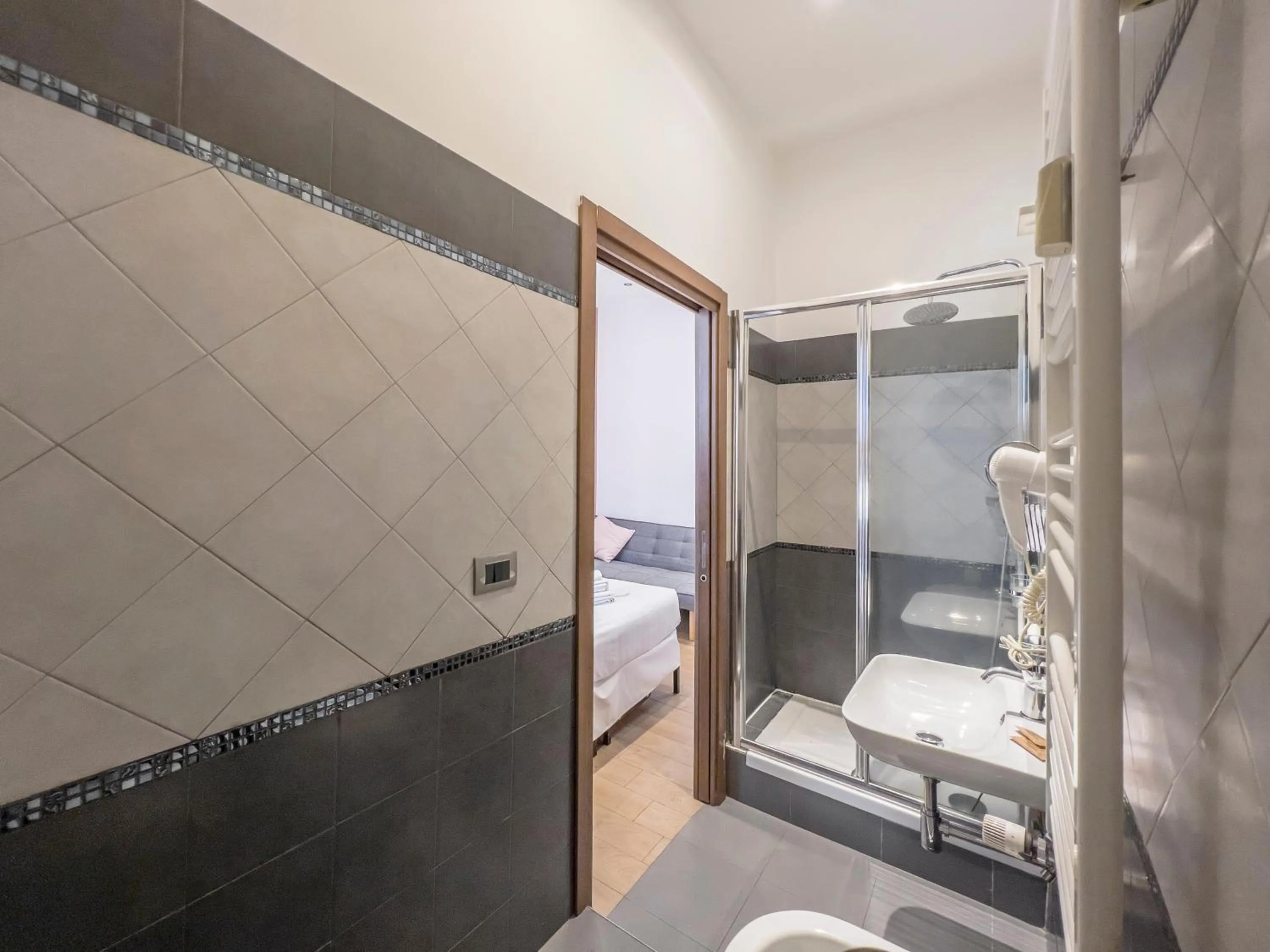 Bed in La Grande Bellezza Guest House Rome